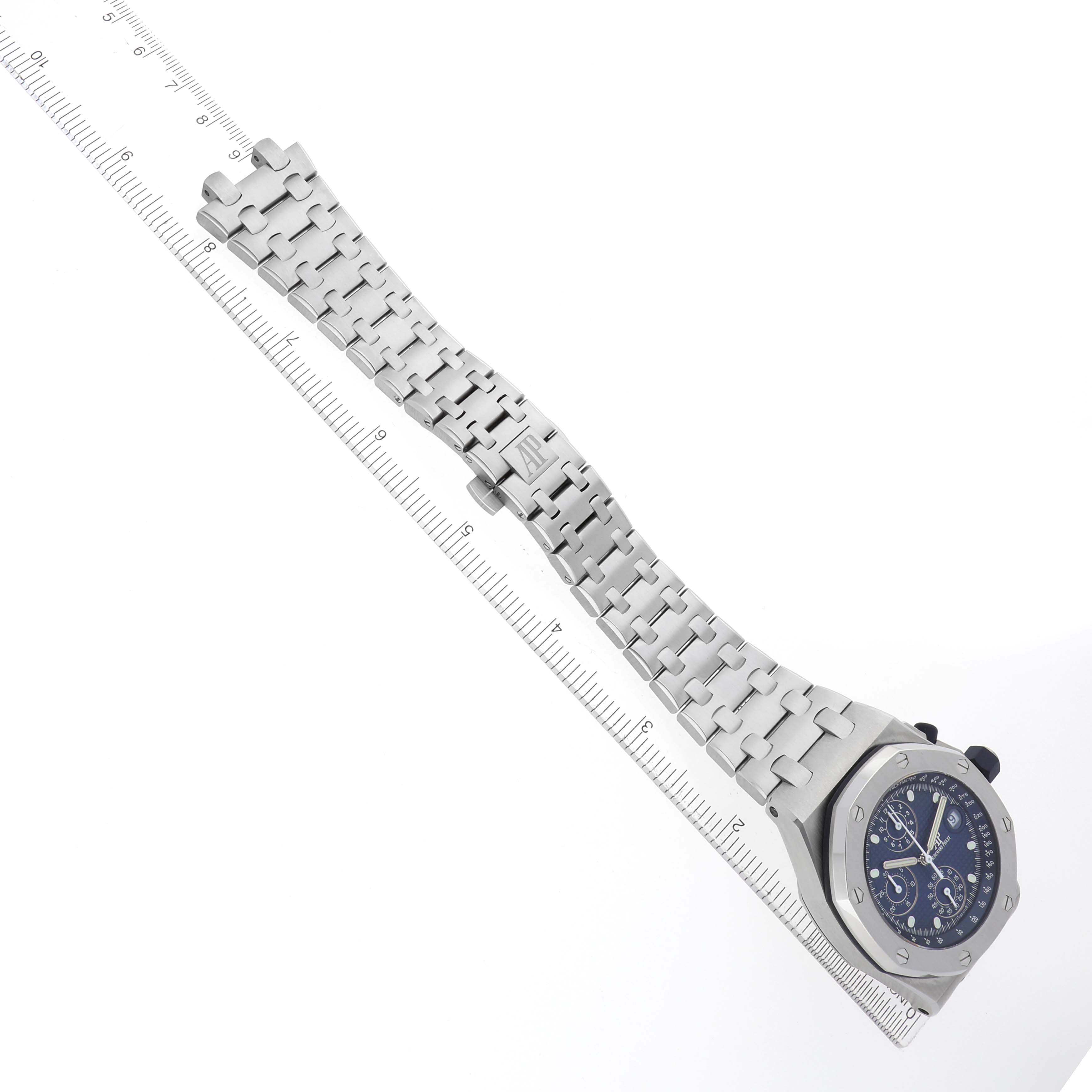 The Audemars Piguet Royal Oak Offshore 26238ST Men's Stainless Steel Blue Dial is shown at an angle displaying the full bracelet, case, and dial with a ruler for scale.