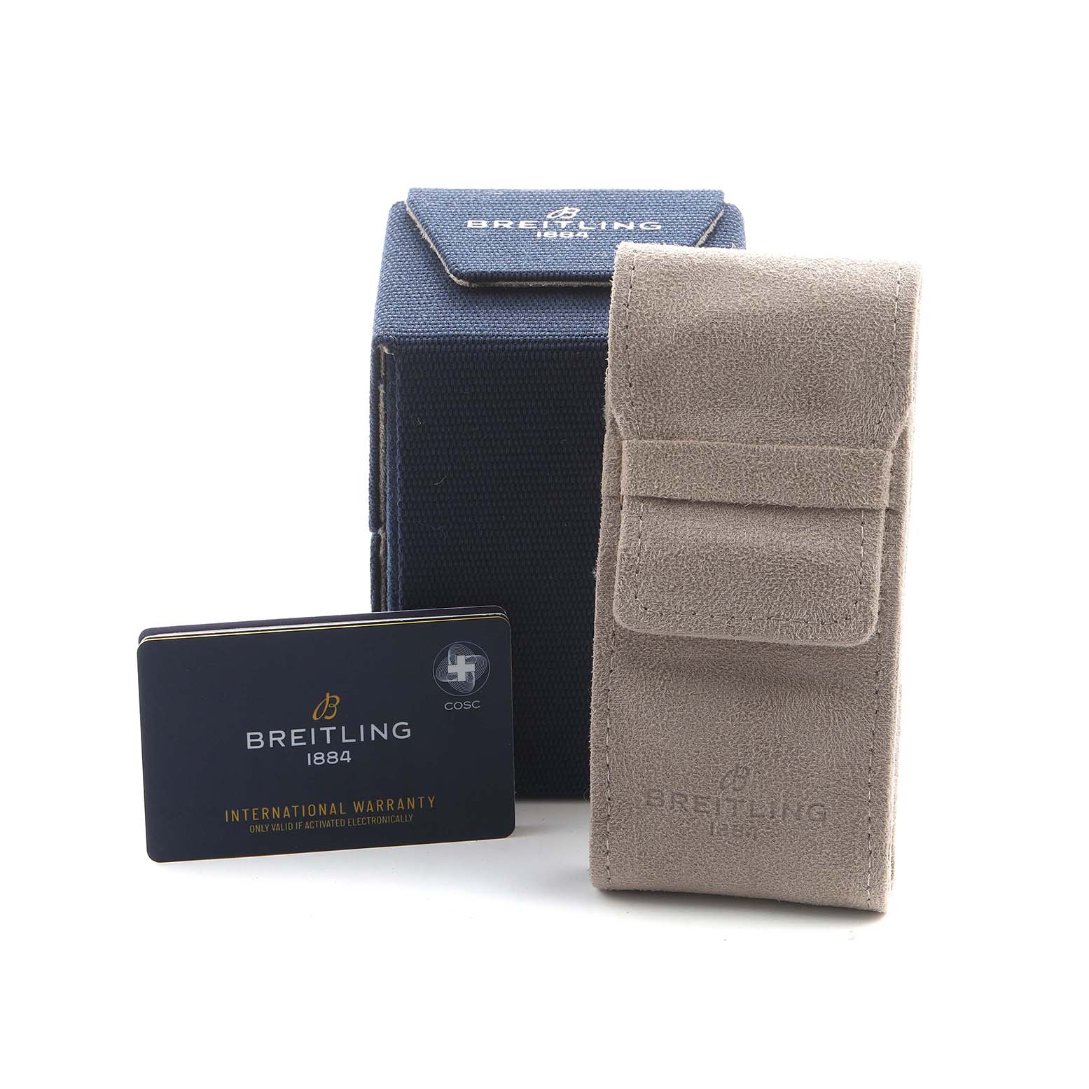 The image shows a Breitling Navitimer AB0137 Men's Stainless Steel Green Dial watch box, suede pouch, and international warranty card from a front angle.