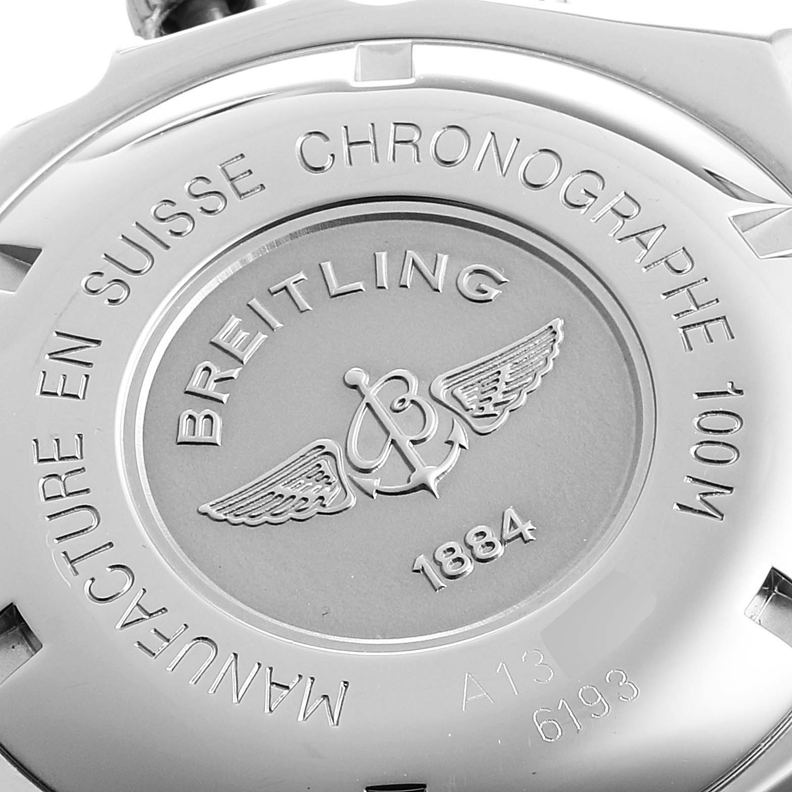 The image shows the case back of a Breitling Chronomat A13055 Men
s Stainless Steel Silver Dial A13055 Men
s Stainless Steel Silver Dial watch, highlighting its engravings and brand logo.