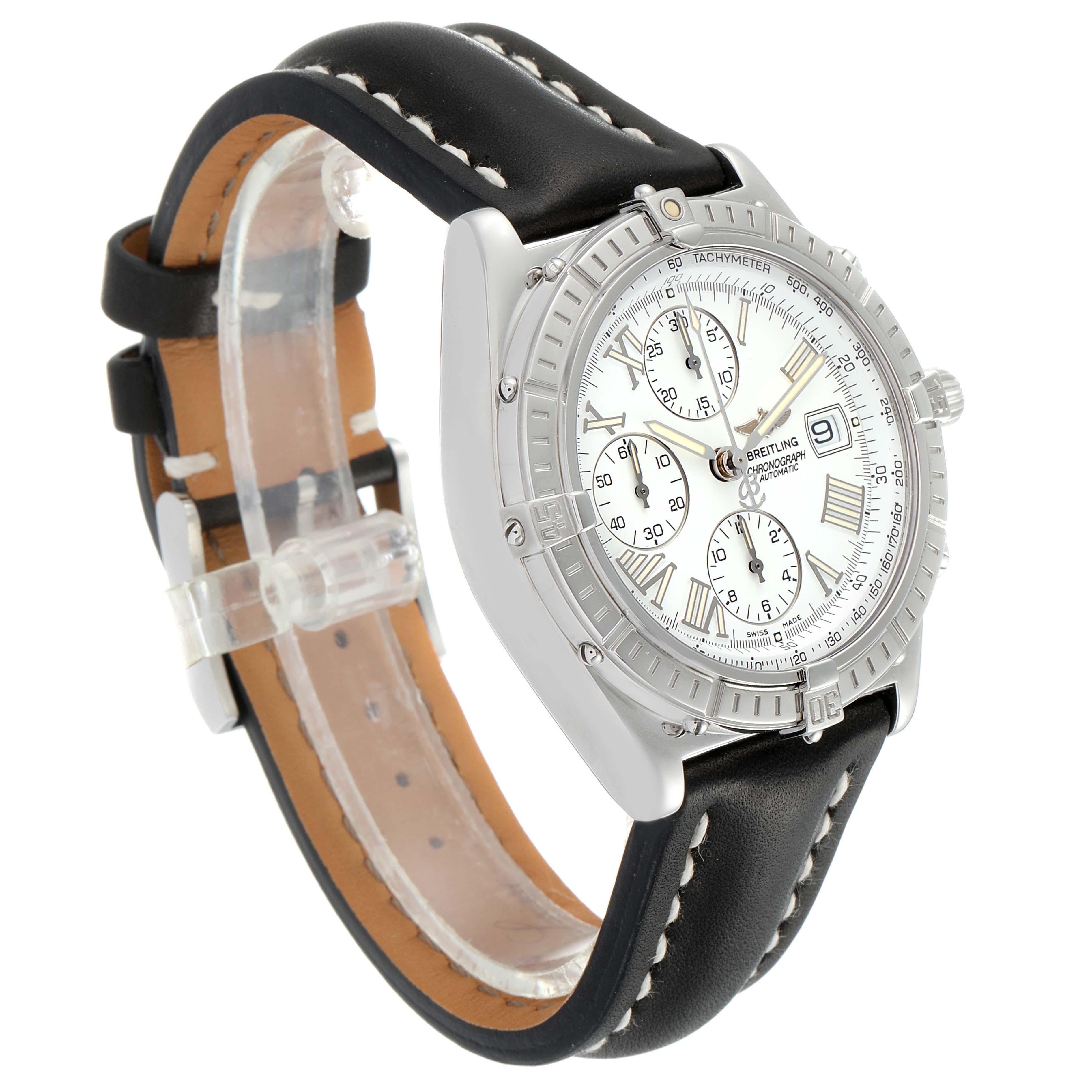 The image shows a Breitling Chronomat A13055 Men
s Stainless Steel Silver Dial A13055 Men
s Stainless Steel Silver Dial watch at an angle displaying its face, bezel, and black leather strap.