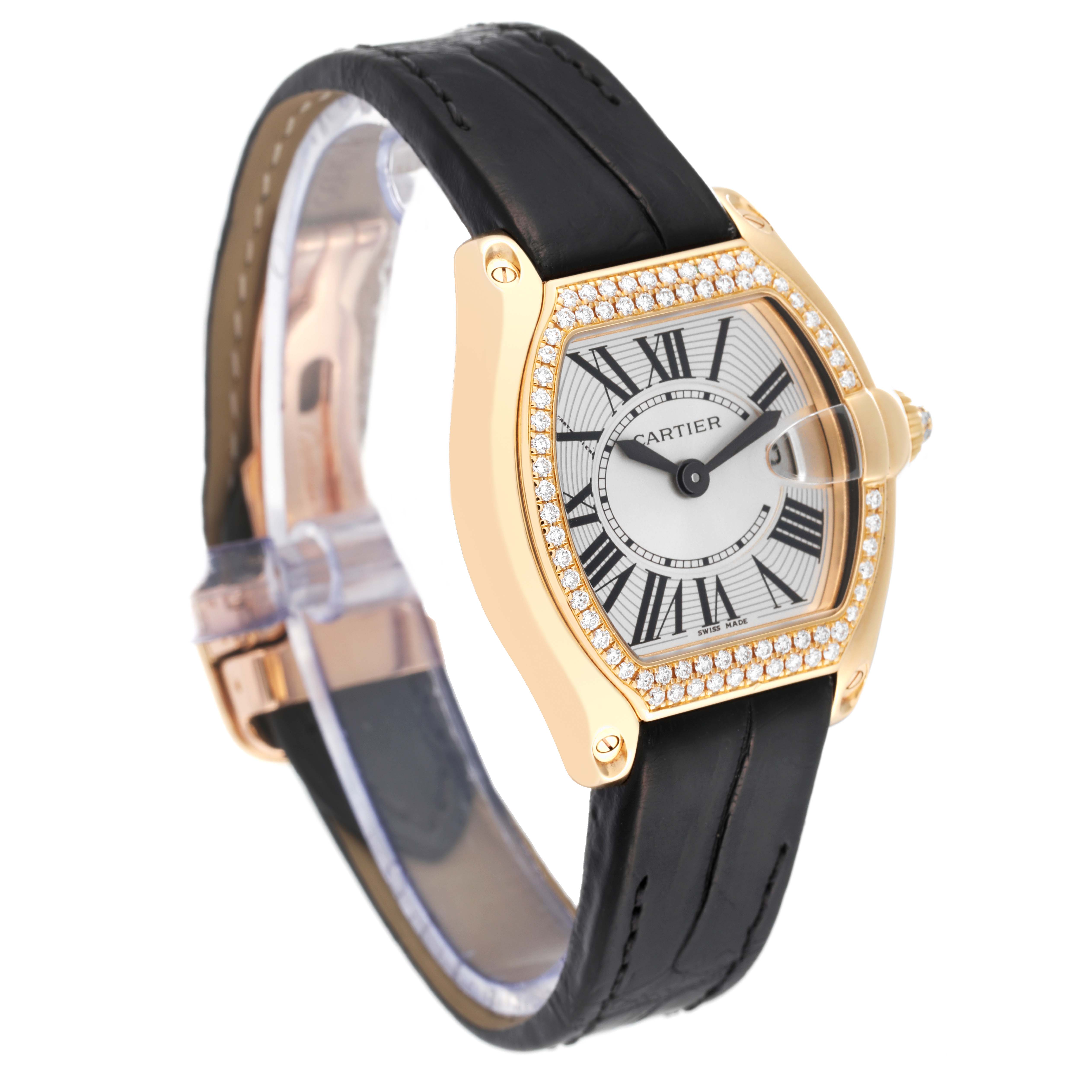 The Cartier Roadster WE500160 Women's Yellow Gold Silver Dial WE500160 Women's Yellow Gold Silver Dial watch is shown at a three-quarter angle, displaying its face, bezel, and black leather strap.