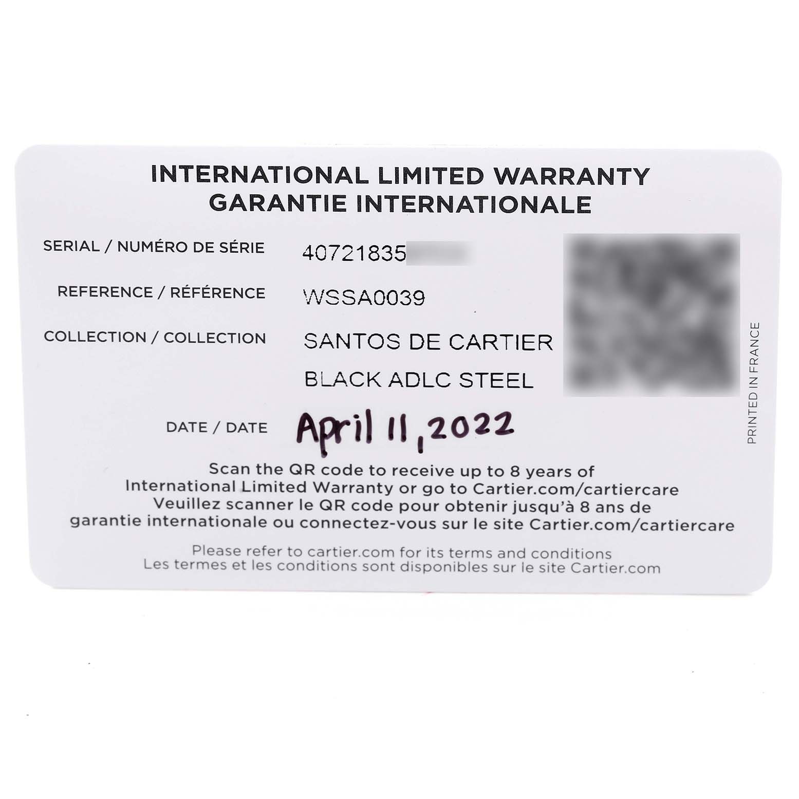 The image shows the International Limited Warranty card for a Santos de Cartier watch by Cartier.