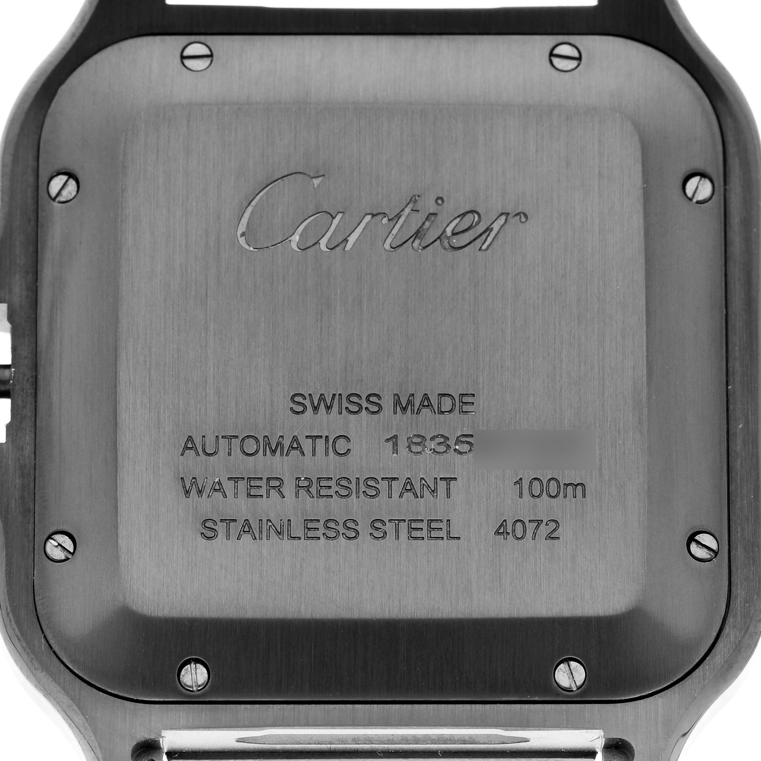 The image shows the back of a Cartier Santos WSSA0039 Men's Stainless Steel Black Dial WSSA0039 Men's Stainless Steel Black Dial watch, displaying information such as "Swiss Made," "Automatic," and "Water Resistant 100m."