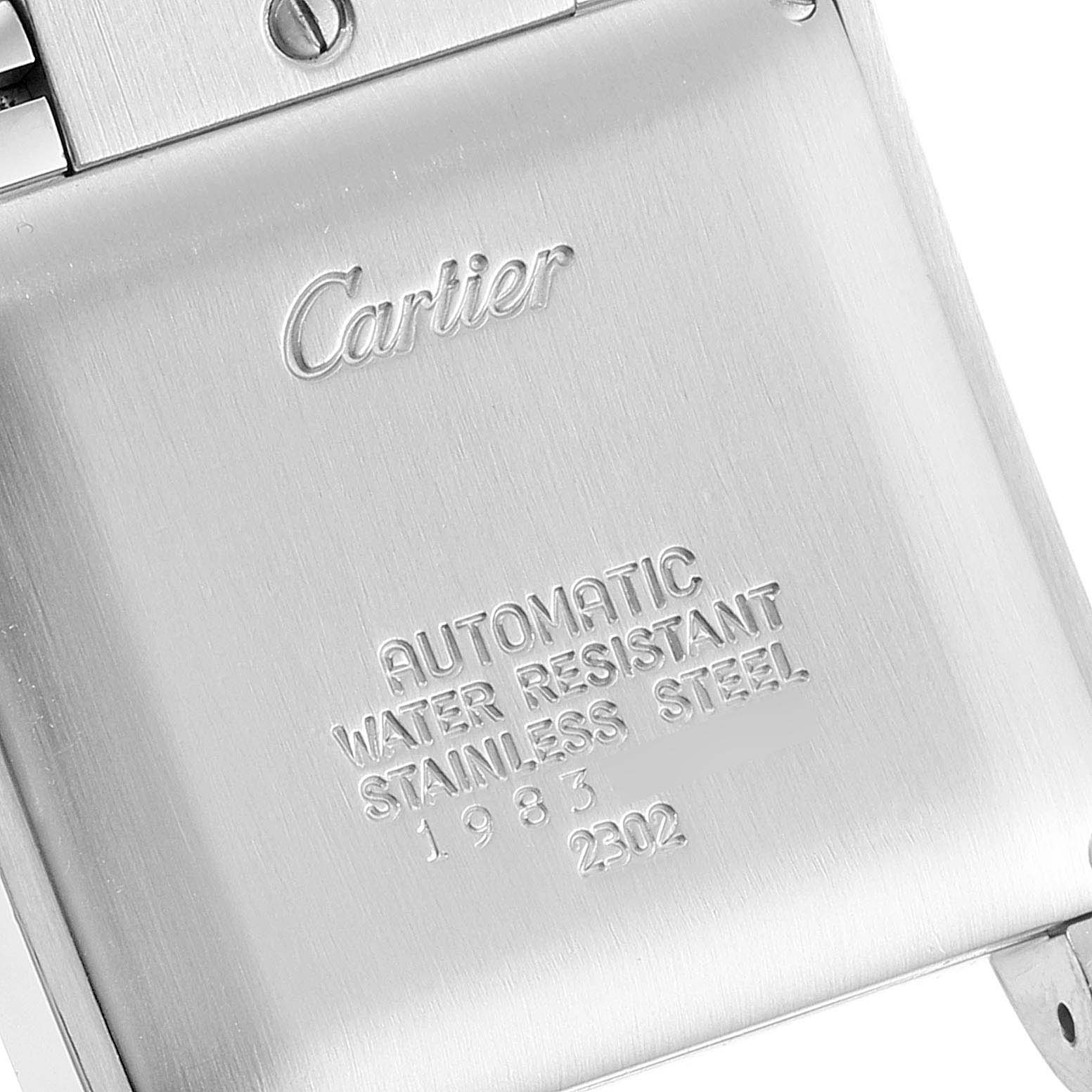 The image shows the back case of the Cartier Tank Francaise W51002Q3 Men's Stainless Steel Silver Dial W51002Q3 Men's Stainless Steel Silver Dial watch, highlighting its engravings and stainless steel material.