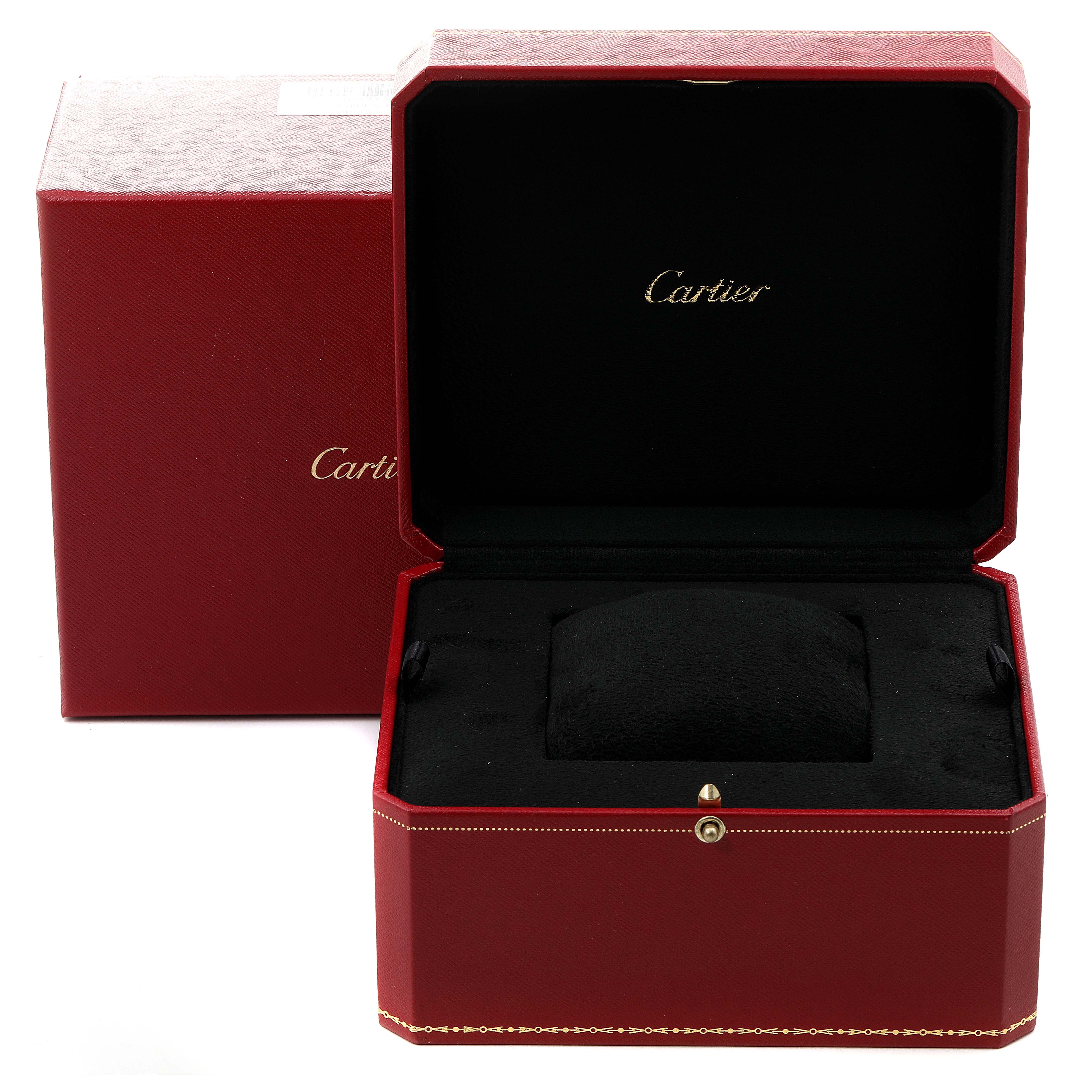 The image shows the open box and outer packaging of the Cartier Tank Française watch.