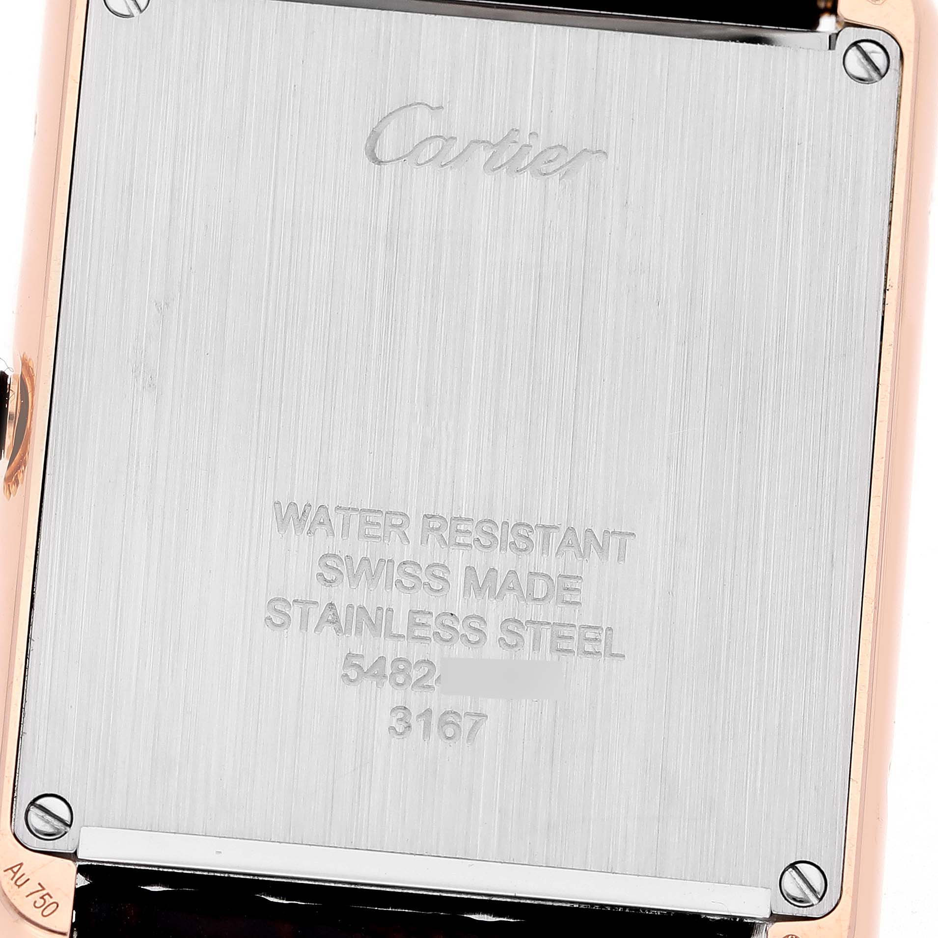 The image shows the back case of a Cartier Tank Solo W5200025 Men's Steel and Gold (two tone) Silver Dial W5200025 Men's Steel and Gold (two tone) Silver Dial watch, highlighting the engraving and screws.