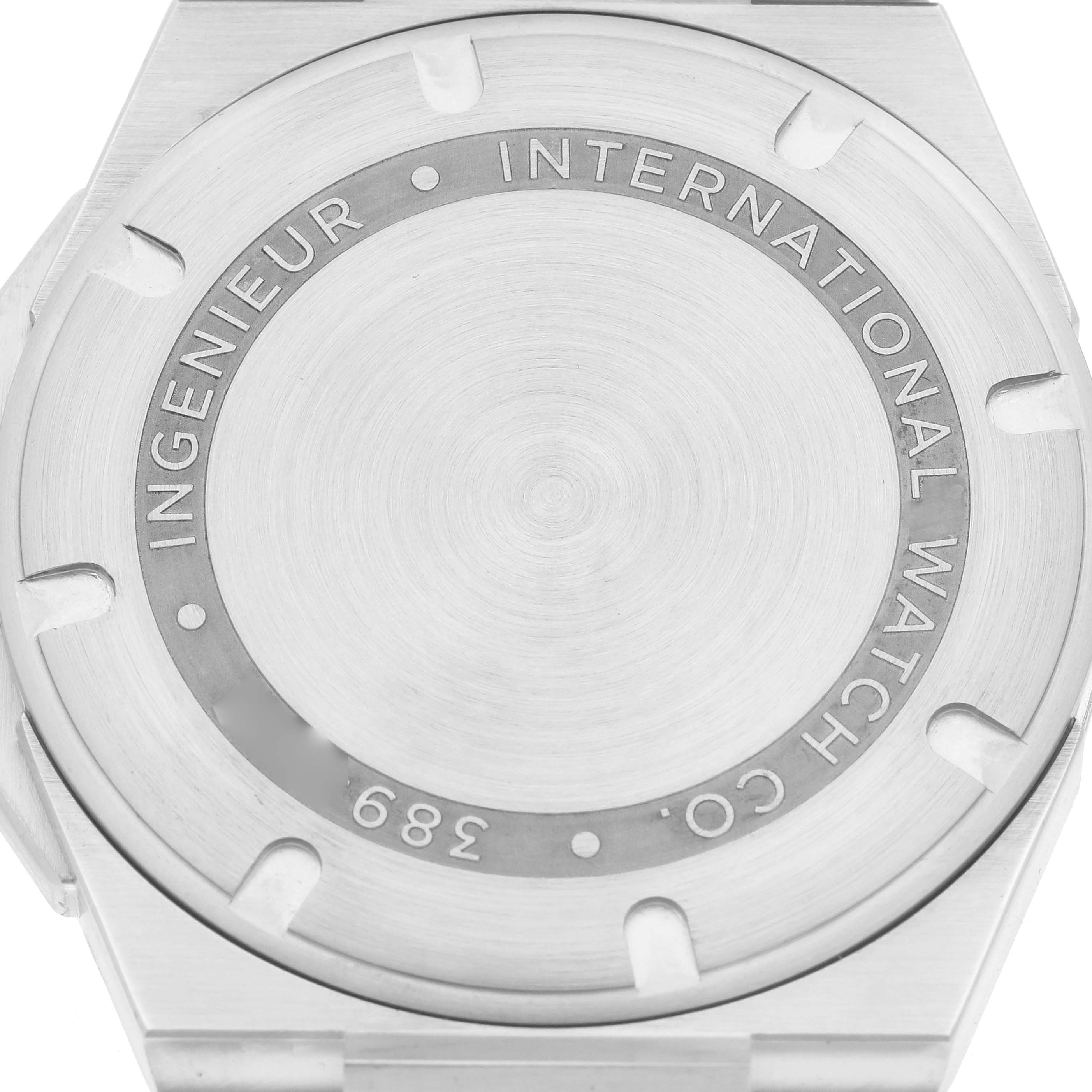The image shows the back casing of an IWC Ingenieur IW323904 Men's Stainless Steel White Dial watch from a top-down angle.