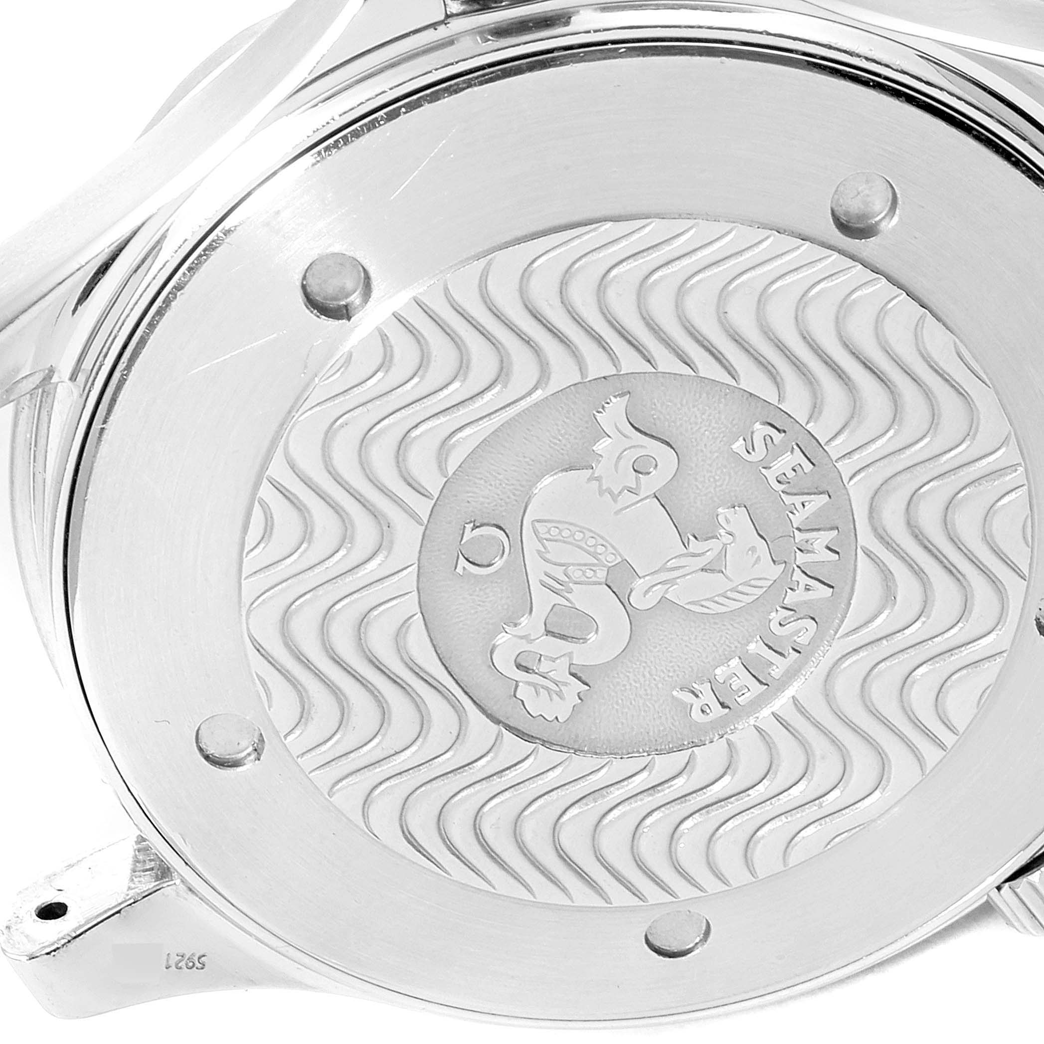 This is a close-up of the back case of an Omega Seamaster 2265.80.00 Men
s Stainless Steel Blue Dial 2265.80.00 Men
s Stainless Steel Blue Dial watch, displaying its embossed logo and wavy pattern.