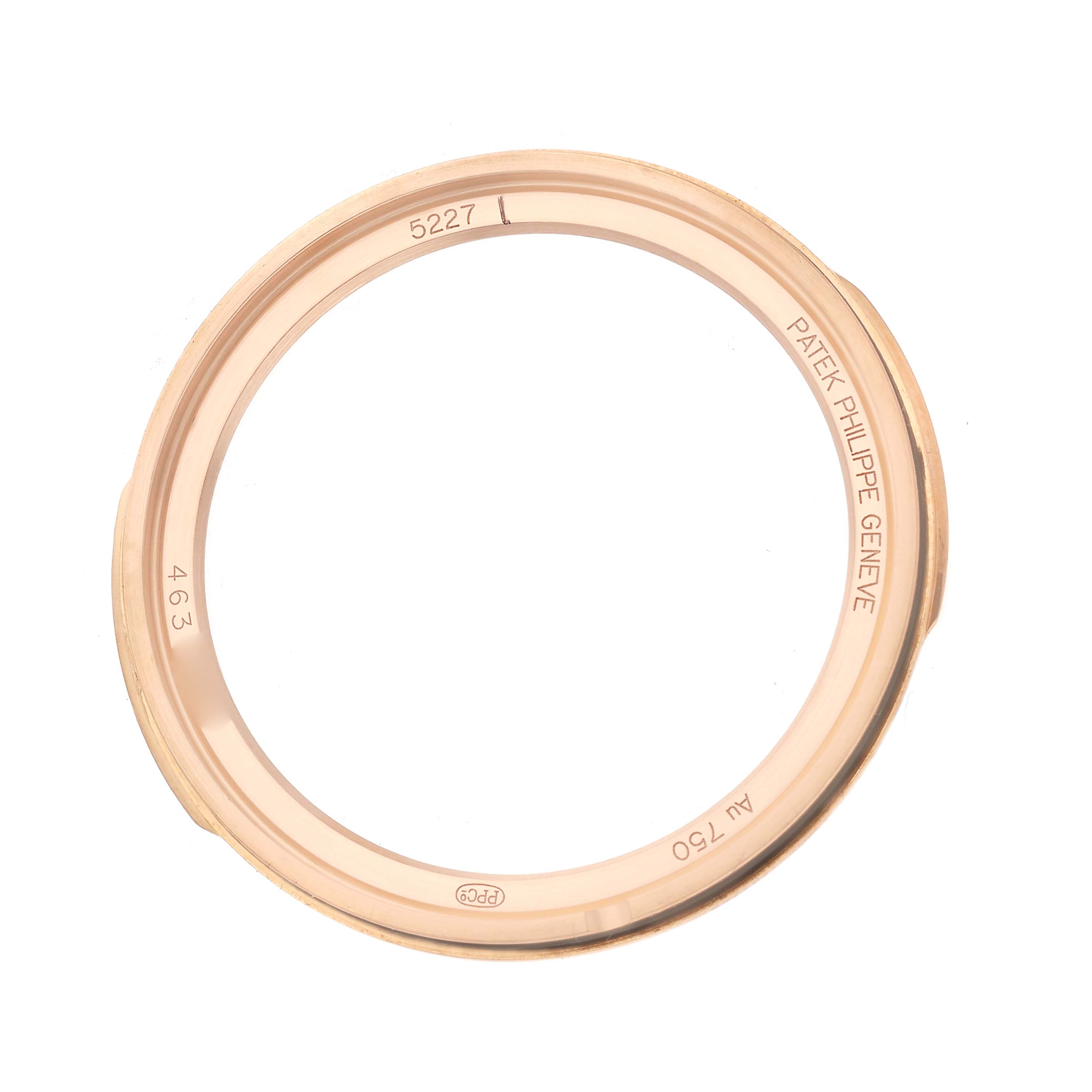 The image shows a top-down view of a Patek Philippe Calatrava 5227R Men's Rose Gold Beige Dial 5227 watch bezel.