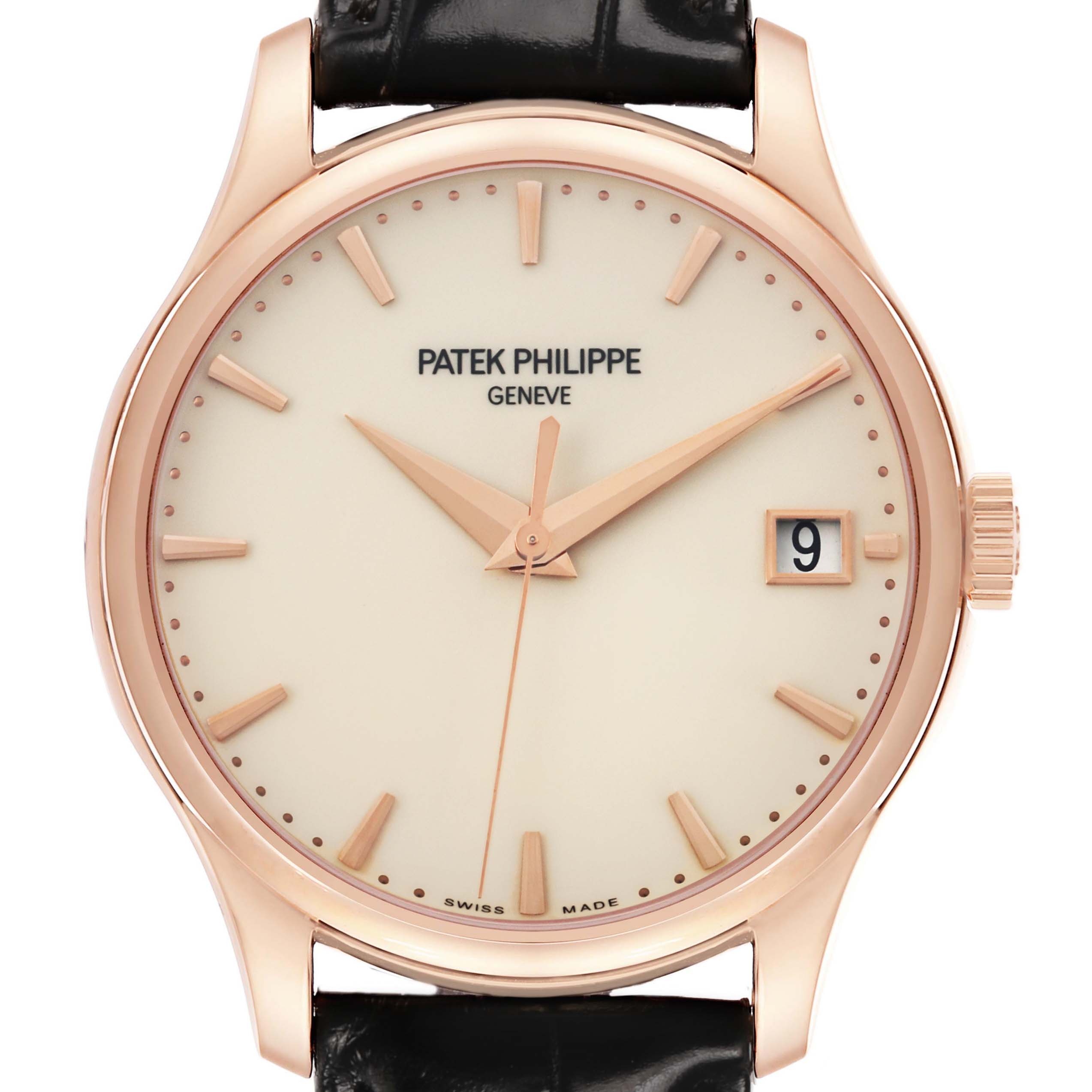 The Patek Philippe Calatrava 5227R Men's Rose Gold Beige Dial watch is shown from a top-down angle, highlighting its dial, hands, indices, and date window.