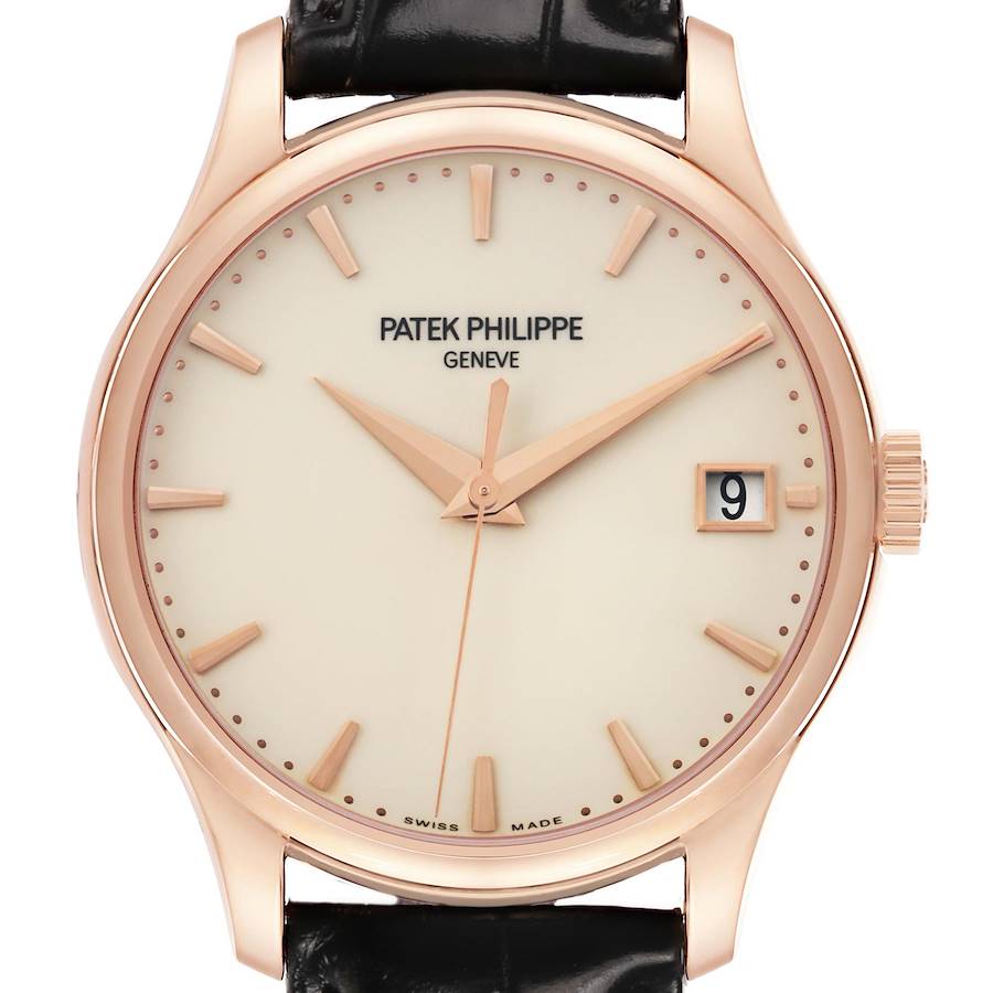 The Patek Philippe Calatrava 5227R Men's Rose Gold Beige Dial watch is shown from a top-down angle, highlighting its dial, hands, indices, and date window.