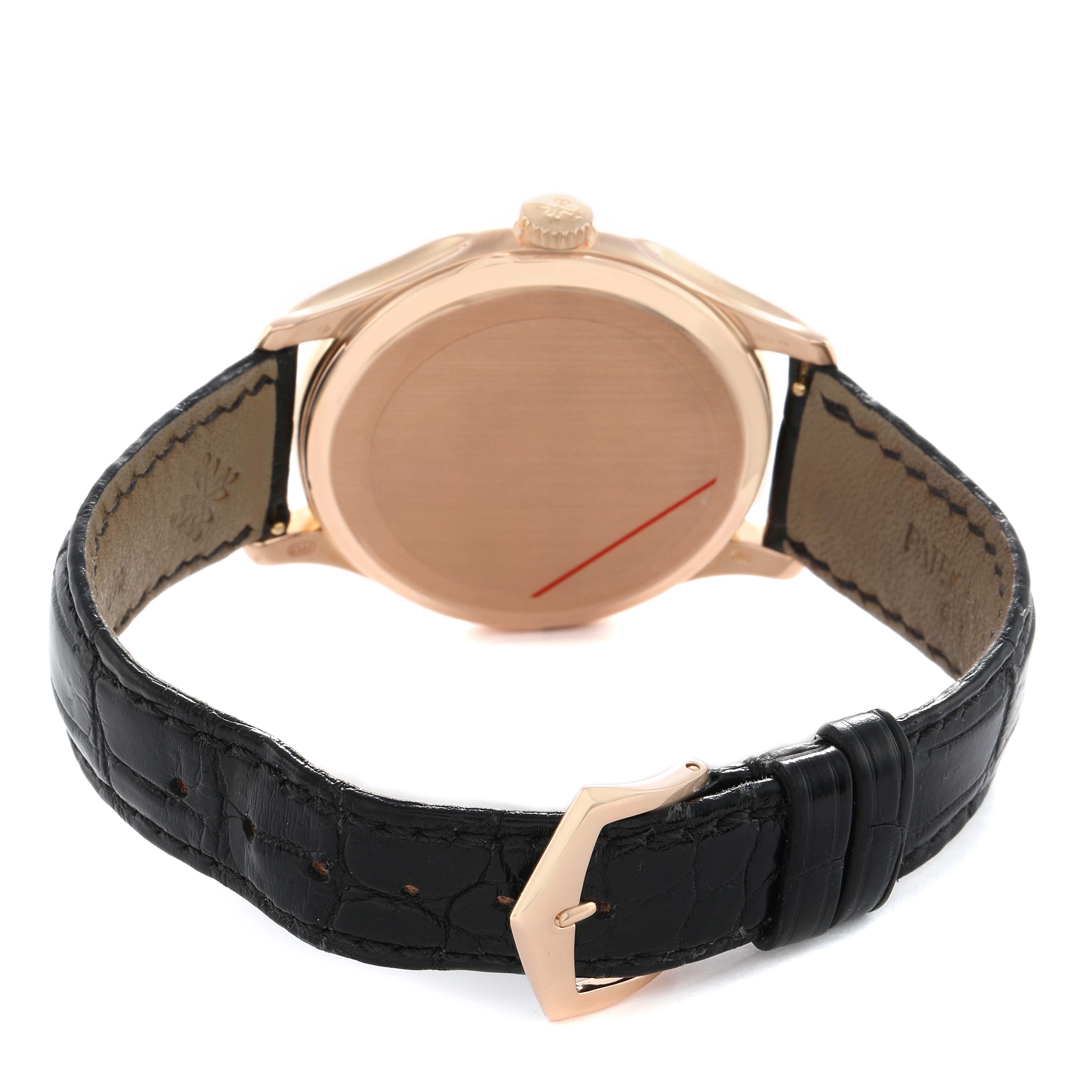 The image shows the back and side of a Patek Philippe Calatrava 5227R Men's Rose Gold Beige Dial watch, highlighting the leather strap and buckle.