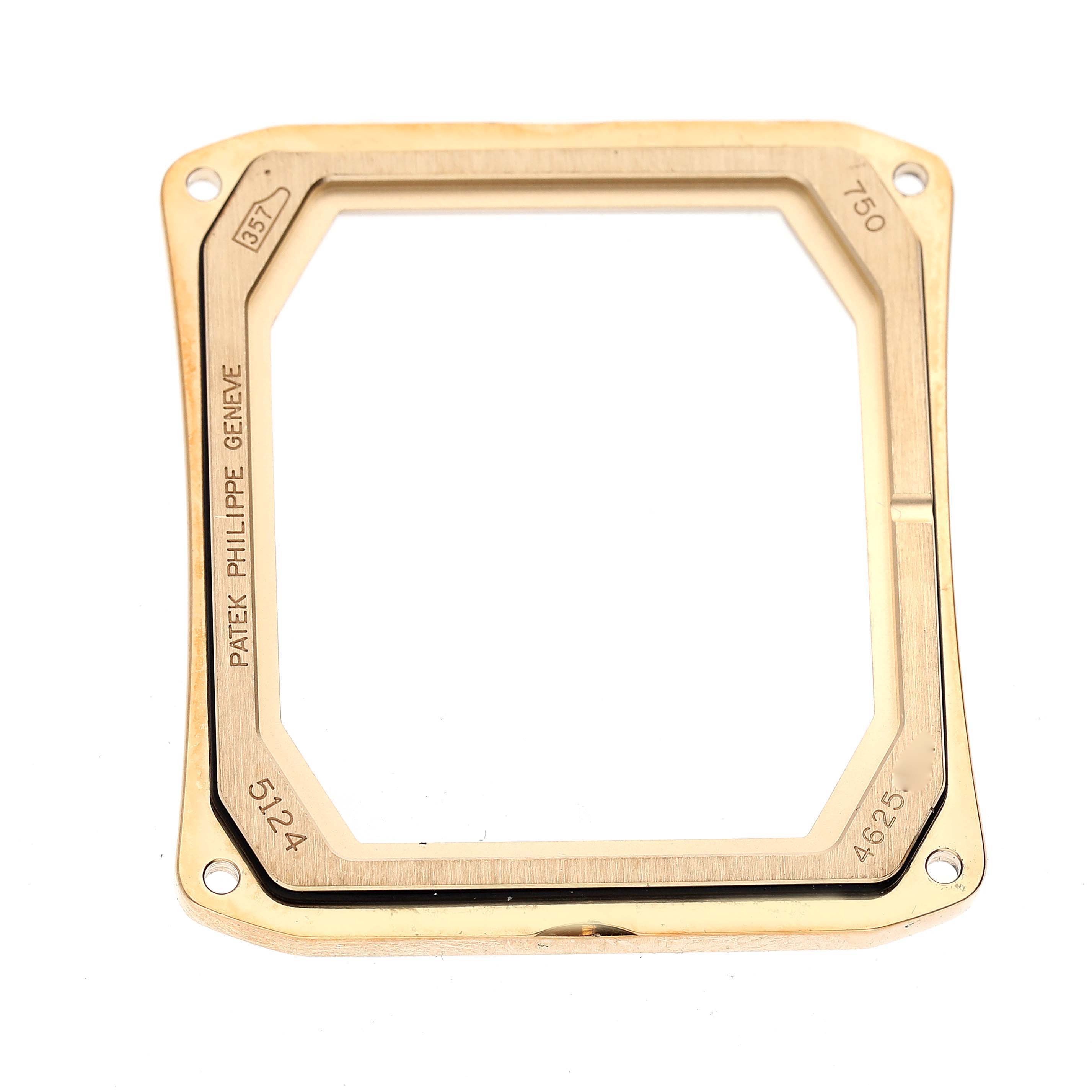 This image shows a Patek Philippe Gondolo 5124J Men's Yellow Gold Silver Dial 5124J Men's Yellow Gold Silver Dial watch case frame with engravings, viewed from the front.