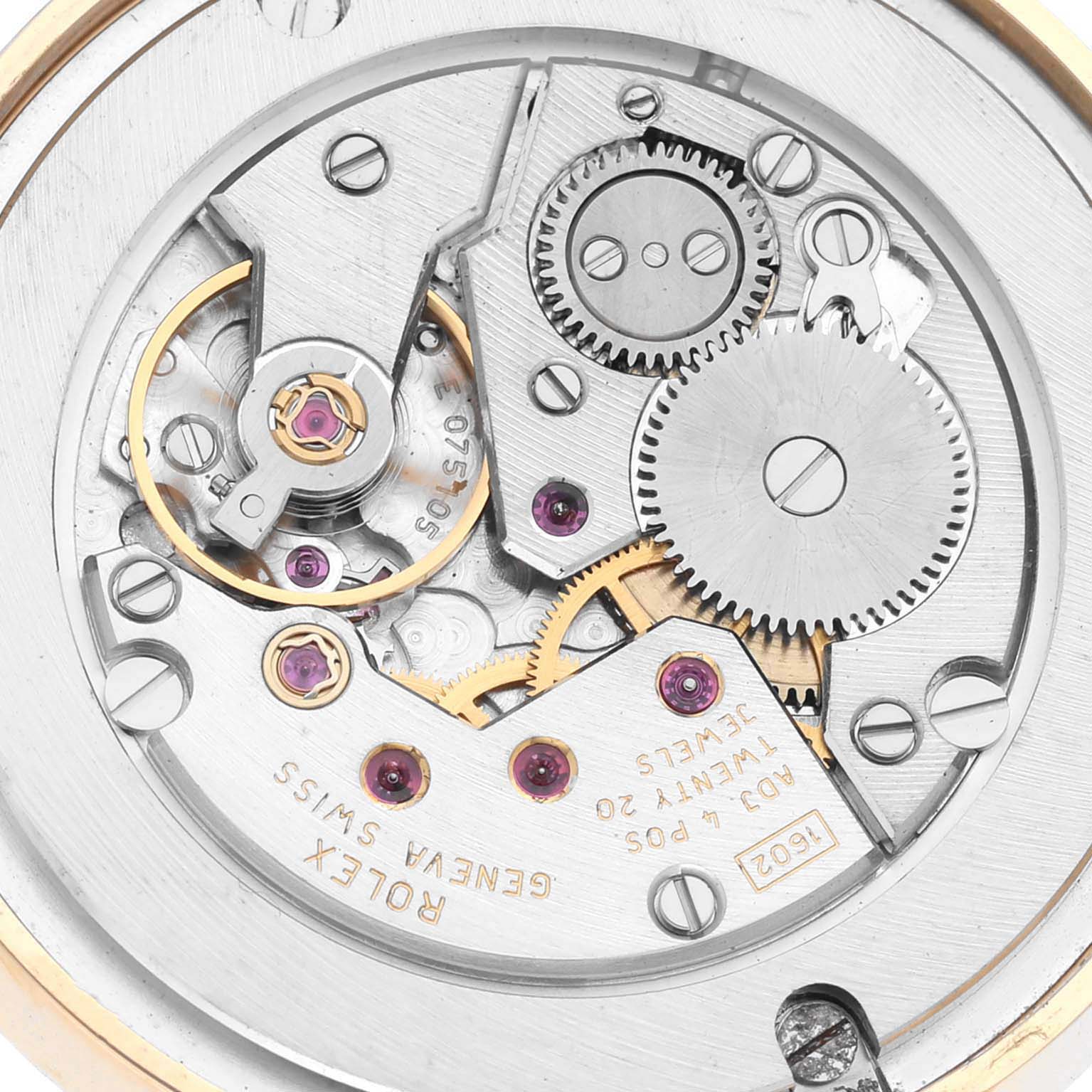 This image shows the intricate internal mechanical movement of a Rolex Cellini 5115/8 Men's Yellow Gold Silver Dial 5115/8 Men's Yellow Gold Silver Dial watch at a close-up angle.