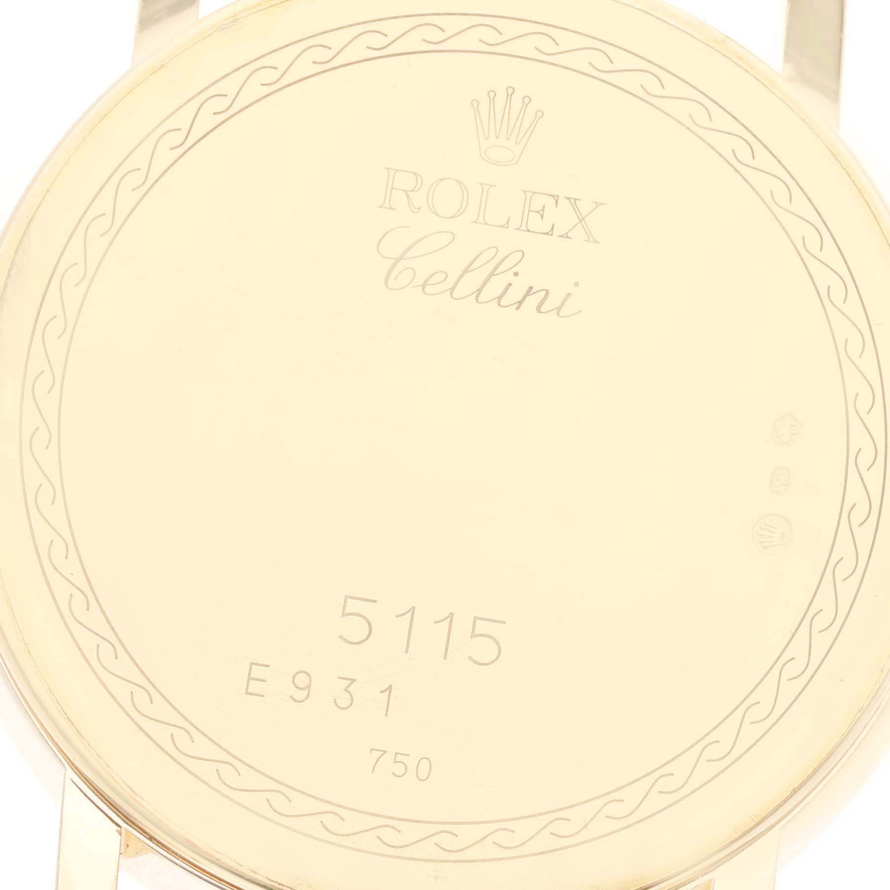 This image shows the back case of a Rolex Cellini 5115/8 Men's Yellow Gold Silver Dial 5115/8 Men's Yellow Gold Silver Dial model watch with engraved details including the model number and hallmark.