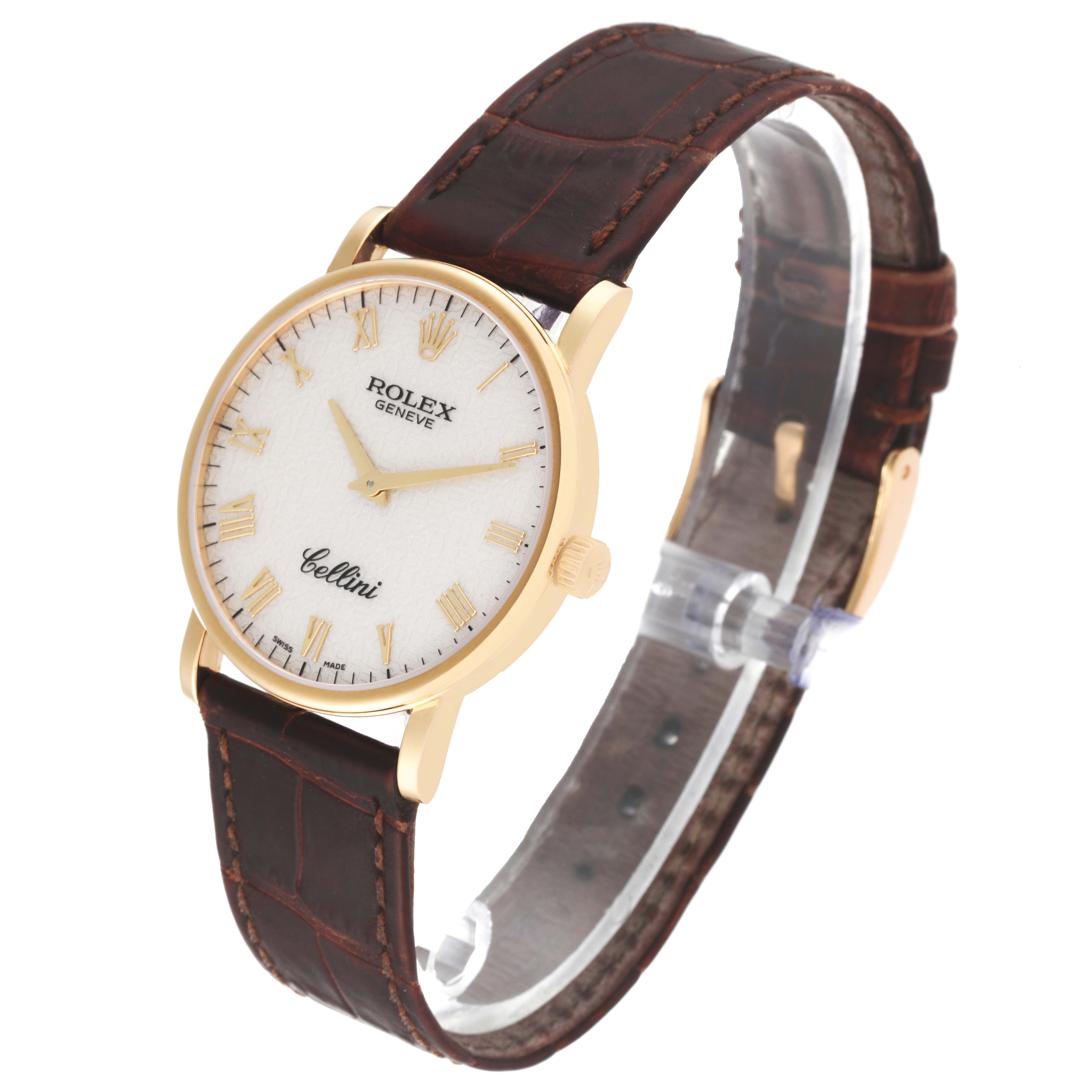 This Rolex Cellini 5115/8 Men's Yellow Gold Silver Dial 5115/8 Men's Yellow Gold Silver Dial watch is shown at a slight angle, displaying its face, leather strap, and clasp.