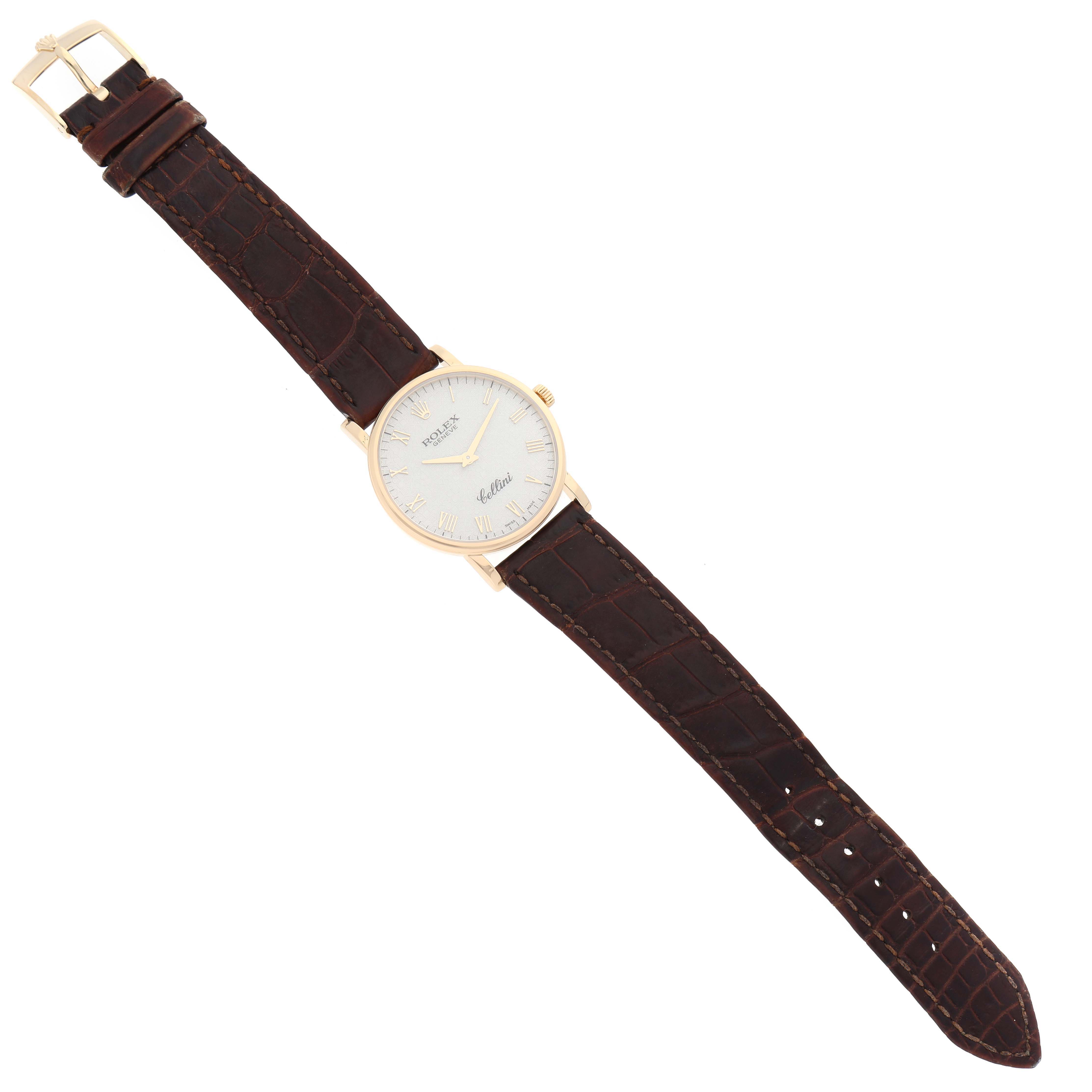 The Rolex Cellini 5115/8 Men's Yellow Gold Silver Dial 5115/8 Men's Yellow Gold Silver Dial watch is displayed flat, showing the entire face, leather strap, crown, and buckle.