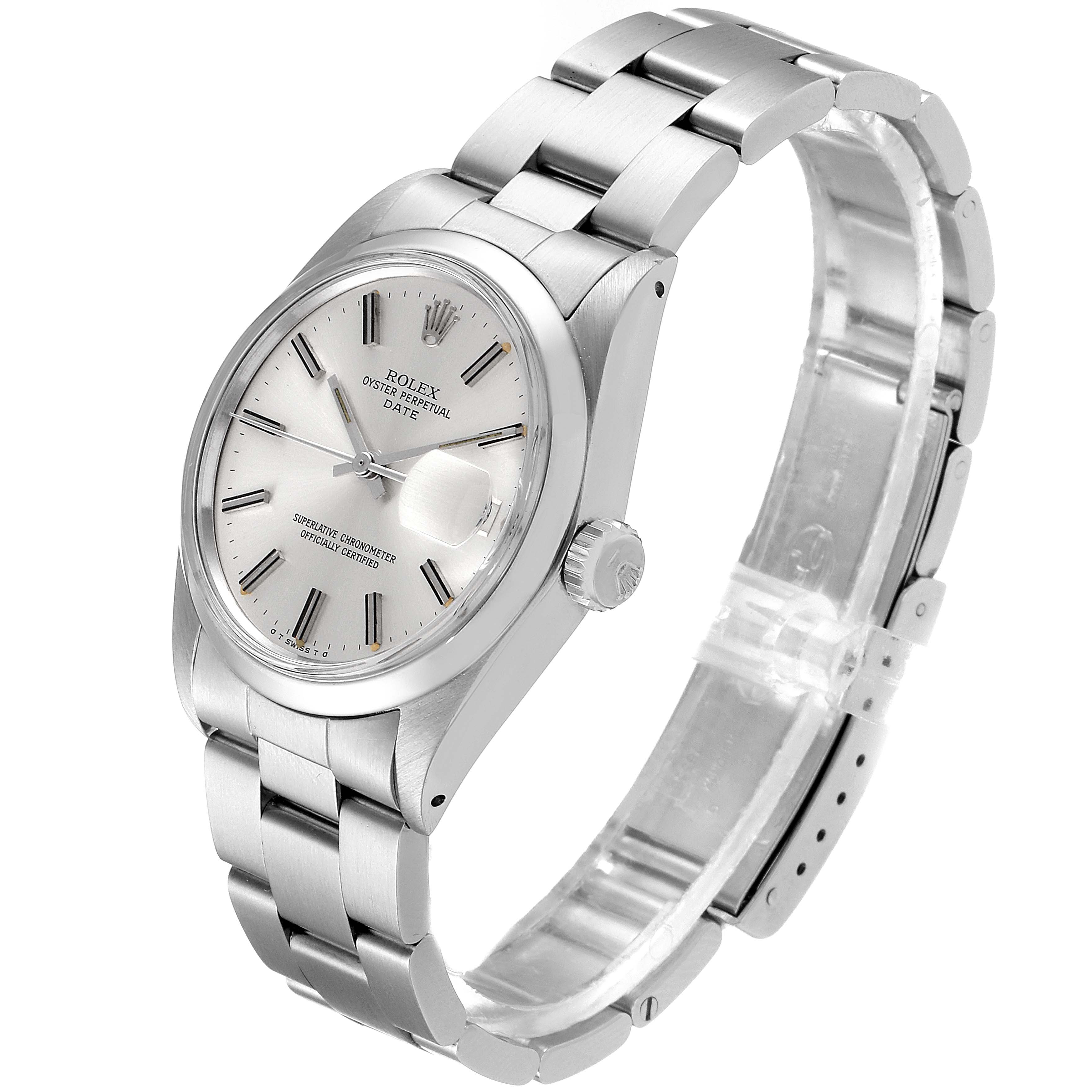 The Vintage Collection Rolex watch is shown at a slight angle, displaying the face, bezel, and part of the bracelet.