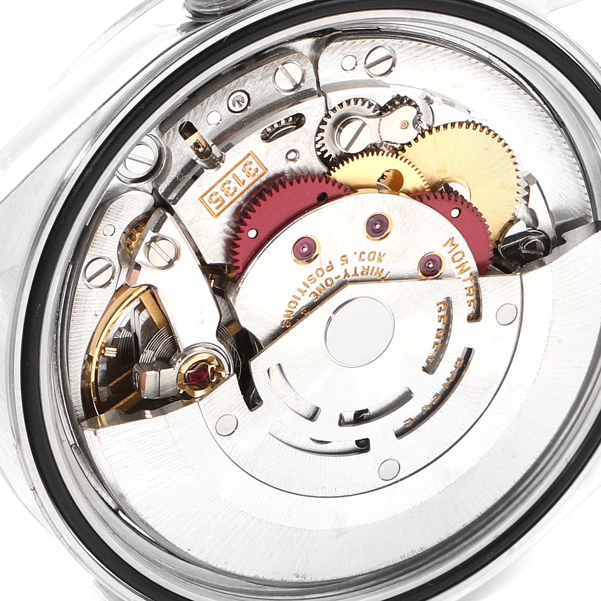 The image shows the internal mechanism and movement of a Rolex Datejust 16234 Men's Stainless Steel Blue Dial 16234 Men's Stainless Steel Blue Dial watch from a close-up angle.