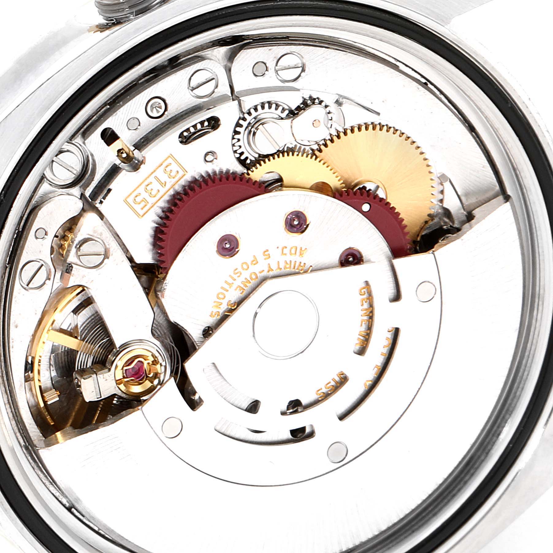 This image shows the inner mechanical movement of a Rolex Datejust 116233 Men's Steel and Gold (two tone) Champagne Dial 116233 Men's Steel and Gold (two tone) Champagne Dial watch from a close-up angle.