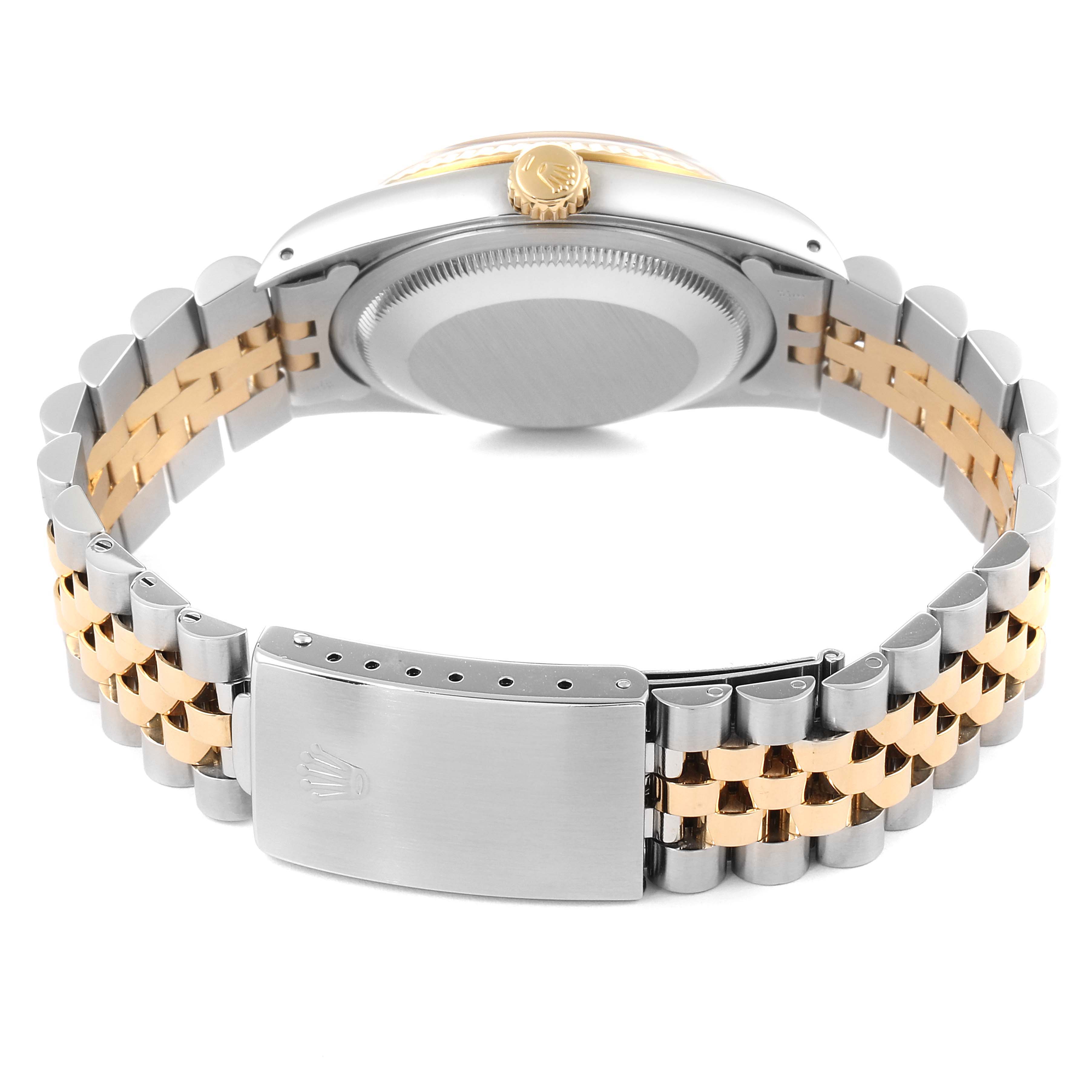 The image shows the back and side view of the band and case of a Rolex Datejust 16233 Men's Steel and Gold (two tone) Champagne Dial 16233 Men's Steel and Gold (two tone) Champagne Dial watch.