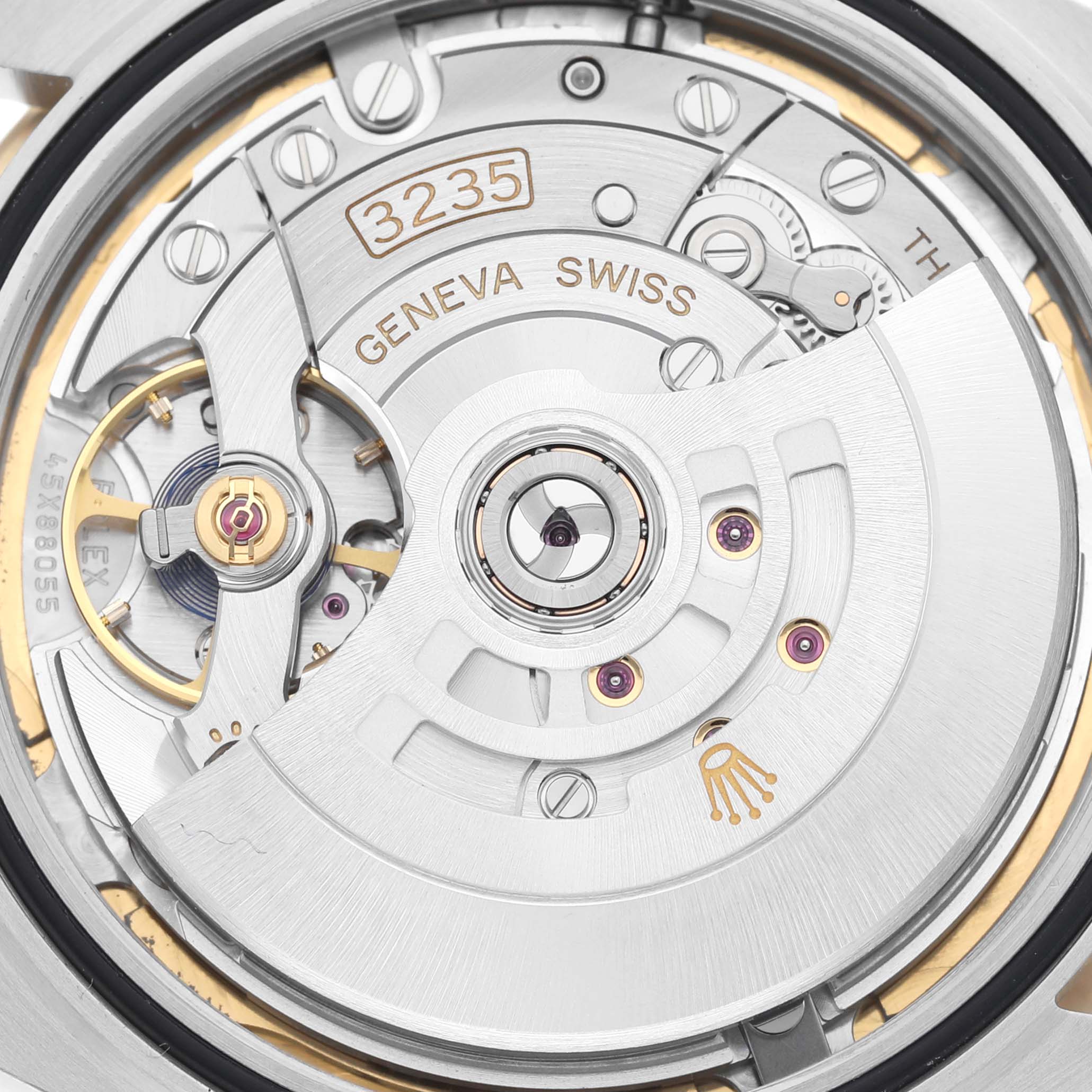 This image shows the interior movement mechanism of the Rolex Datejust 41 126333 Men's Steel and Gold (two tone) White Dial 126333 Men's Steel and Gold (two tone) White Dial, model 3235.