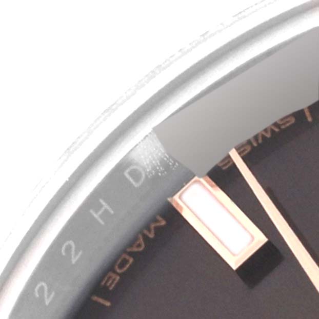 This close-up image shows part of the dial and bezel of the Rolex Datejust 279171 Women's Steel and Gold (two tone) Brown Dial 279171 Women's Steel and Gold (two tone) Brown Dial watch.