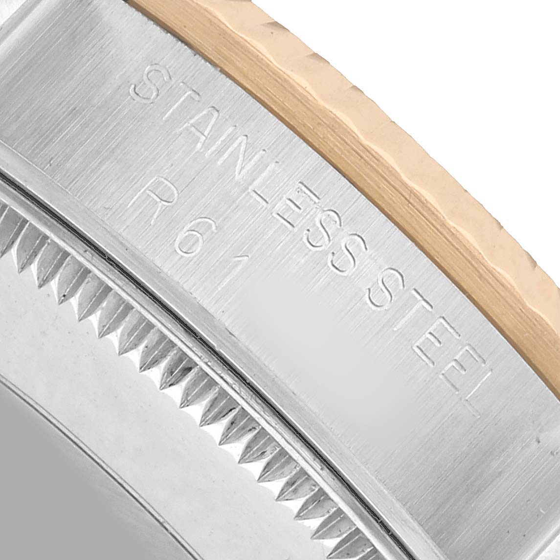 The image shows a close-up of the side of a Rolex Mid-Size 68273 Women's Steel and Gold (two tone) White Dial model, highlighting the stainless steel and bezel details.