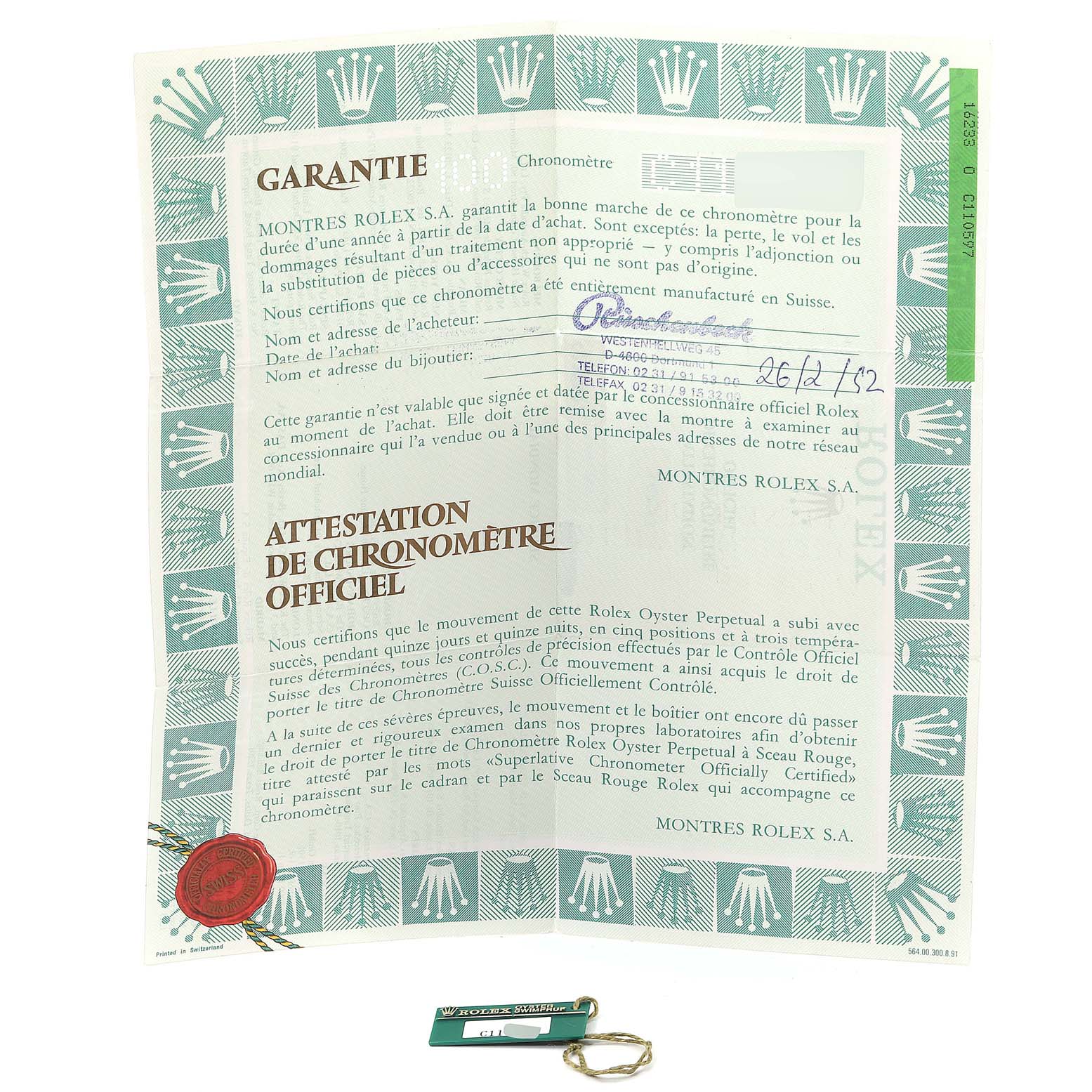 The image shows the warranty certificate and tag for the Rolex Datejust 16233 Men's Steel and Gold (two tone) Champagne Dial 16233 Men's Steel and Gold (two tone) Champagne Dial watch model.