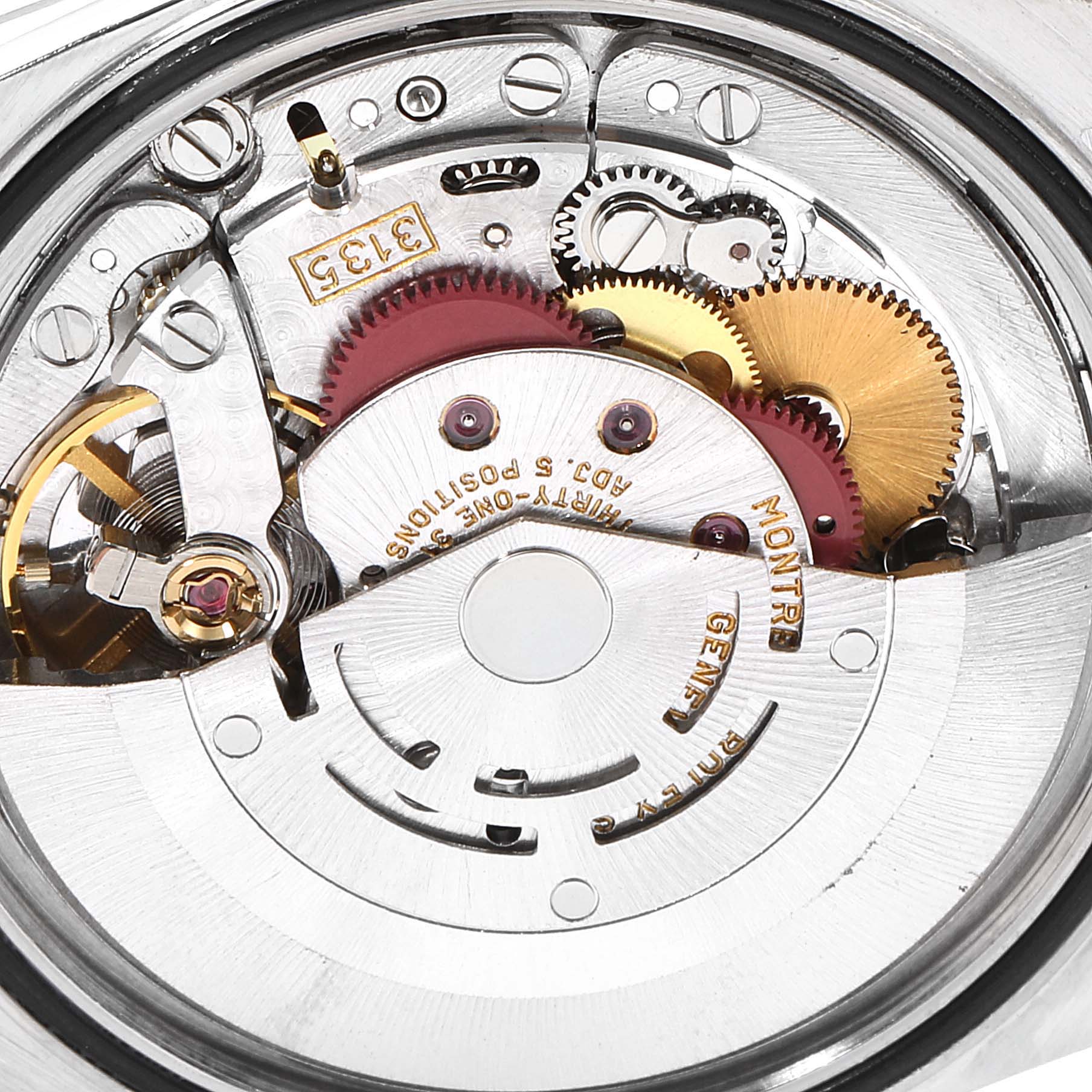 Close-up of the Rolex Datejust 16233 Men's Steel and Gold (two tone) Champagne Dial 16233 Men's Steel and Gold (two tone) Champagne Dial watch movement showing gears, balance wheel, and intricate parts.