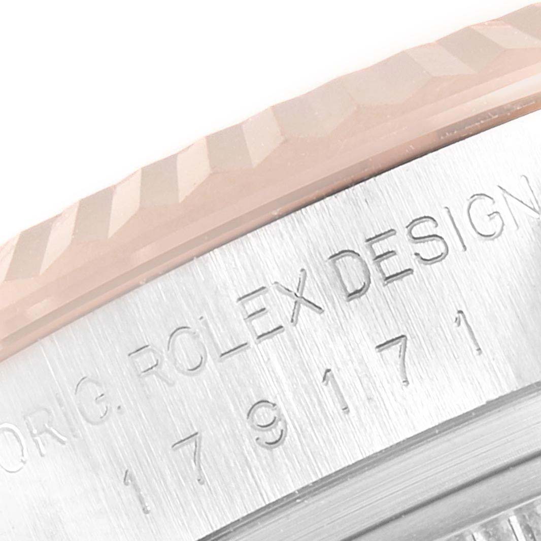 The image shows a close-up of the bezel and engraved case side of a Rolex Datejust 179171 Women's Steel and Gold (two tone) Grey Dial 179171 Women's Steel and Gold (two tone) Grey Dial watch.