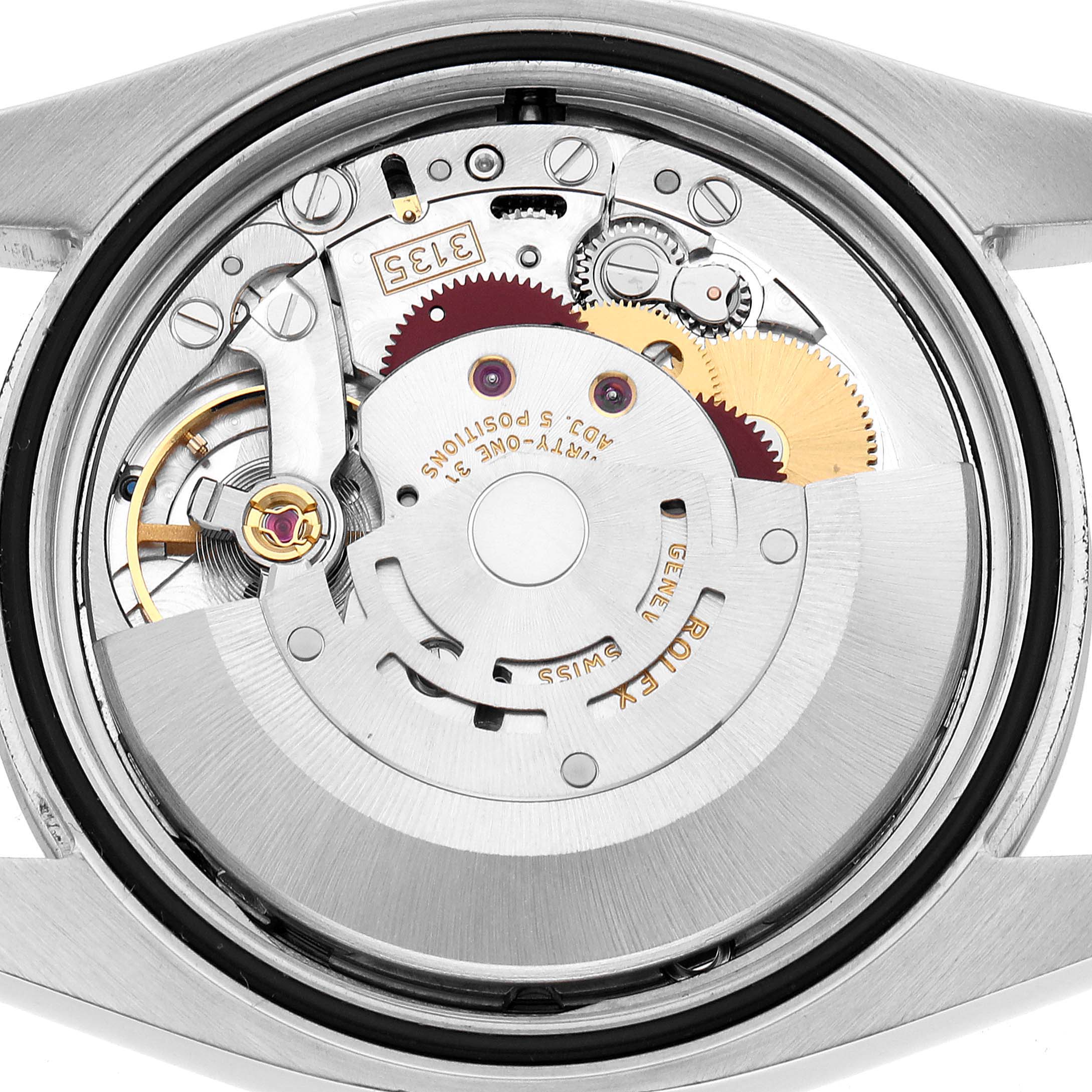This image shows the movement from the back of a Rolex Datejust 116200 Men's Stainless Steel Silver Dial, highlighting the intricate rotor and gear components.
