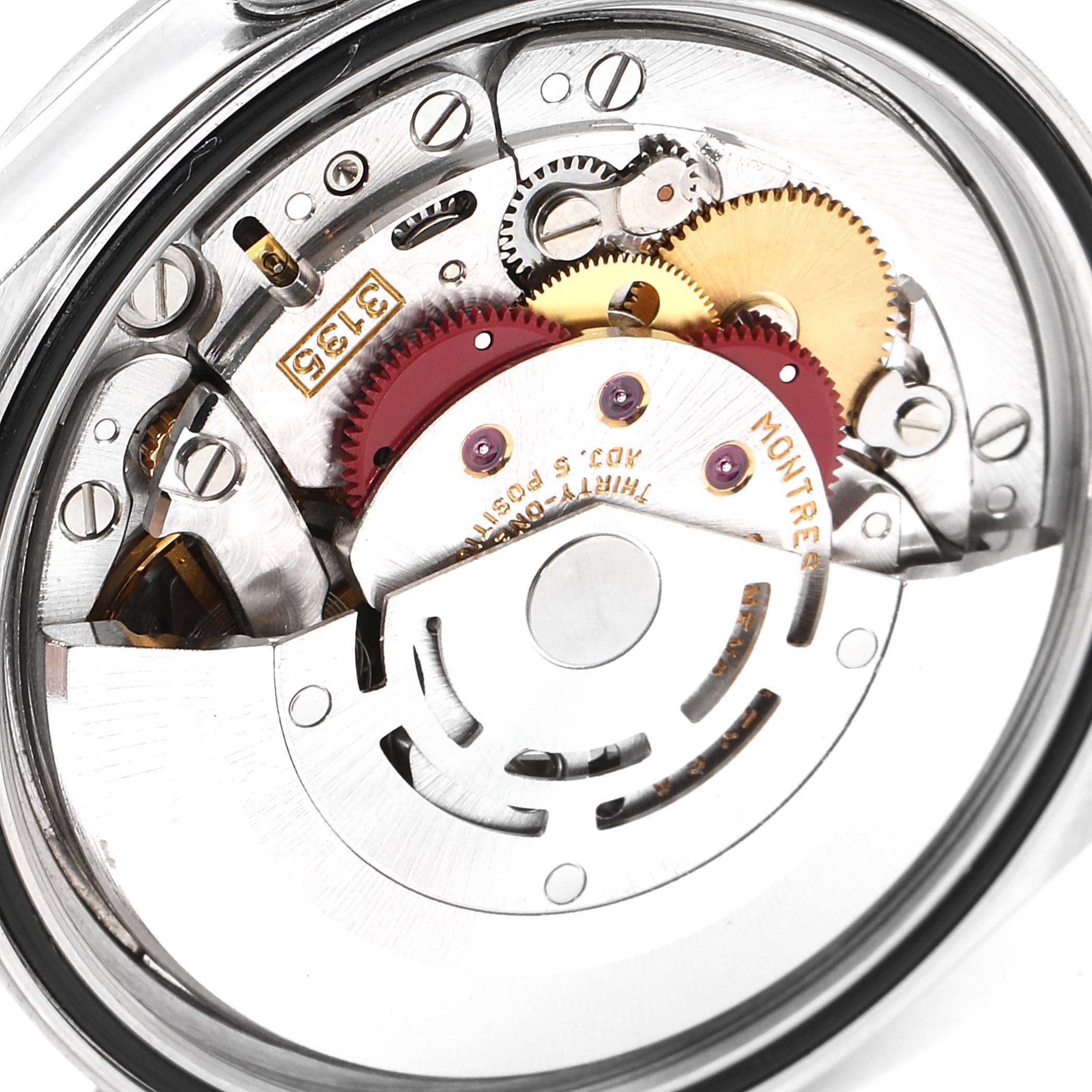 The image shows the exposed mechanical movement and inner gears of a Rolex Datejust 16234 Men
s Stainless Steel Black Dial 16234 Men
s Stainless Steel Black Dial watch, viewed from the back.