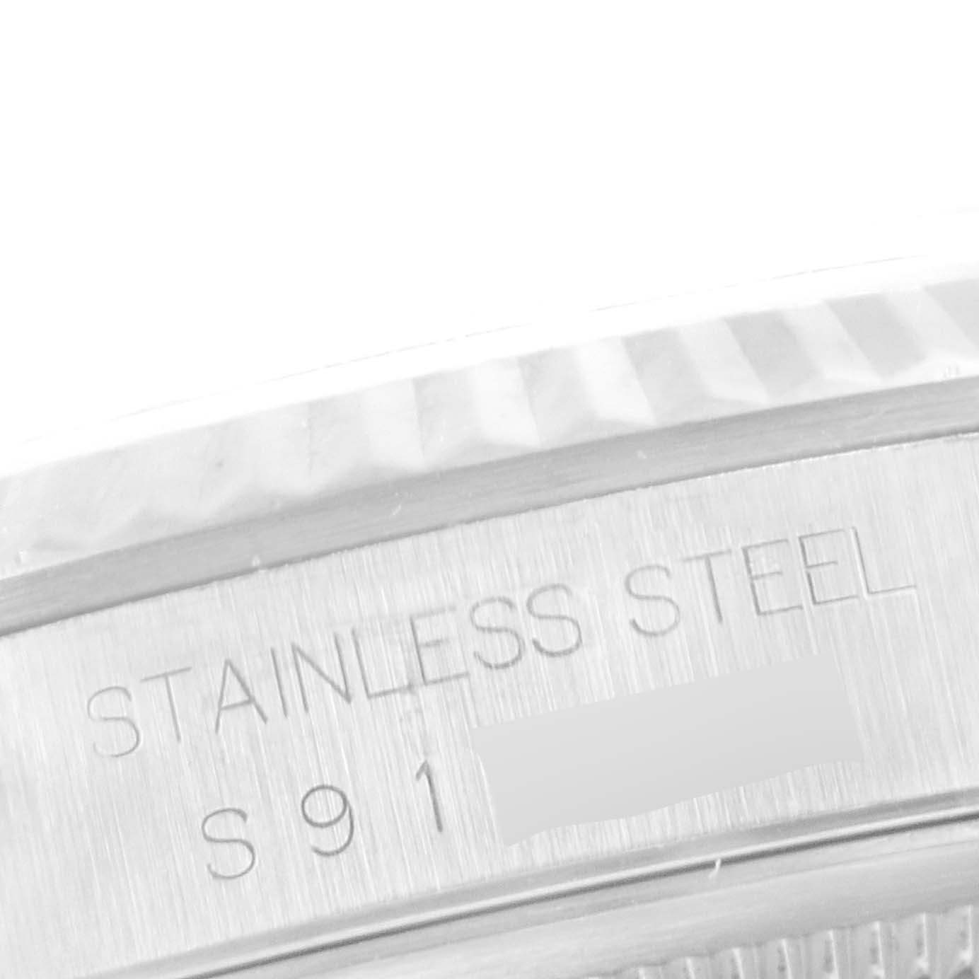 This image shows a close-up angle of the stainless steel casing and engraved serial number of a Rolex Datejust 16234 Men
s Stainless Steel Black Dial 16234 Men
s Stainless Steel Black Dial watch.