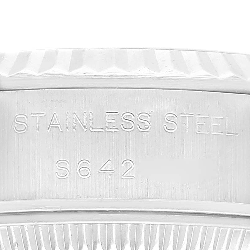 The image shows the case edge of a Rolex Datejust 69174 Women's Stainless Steel Silver Dial 69174 Women's Stainless Steel Silver Dial model, focusing on the stainless steel marking.