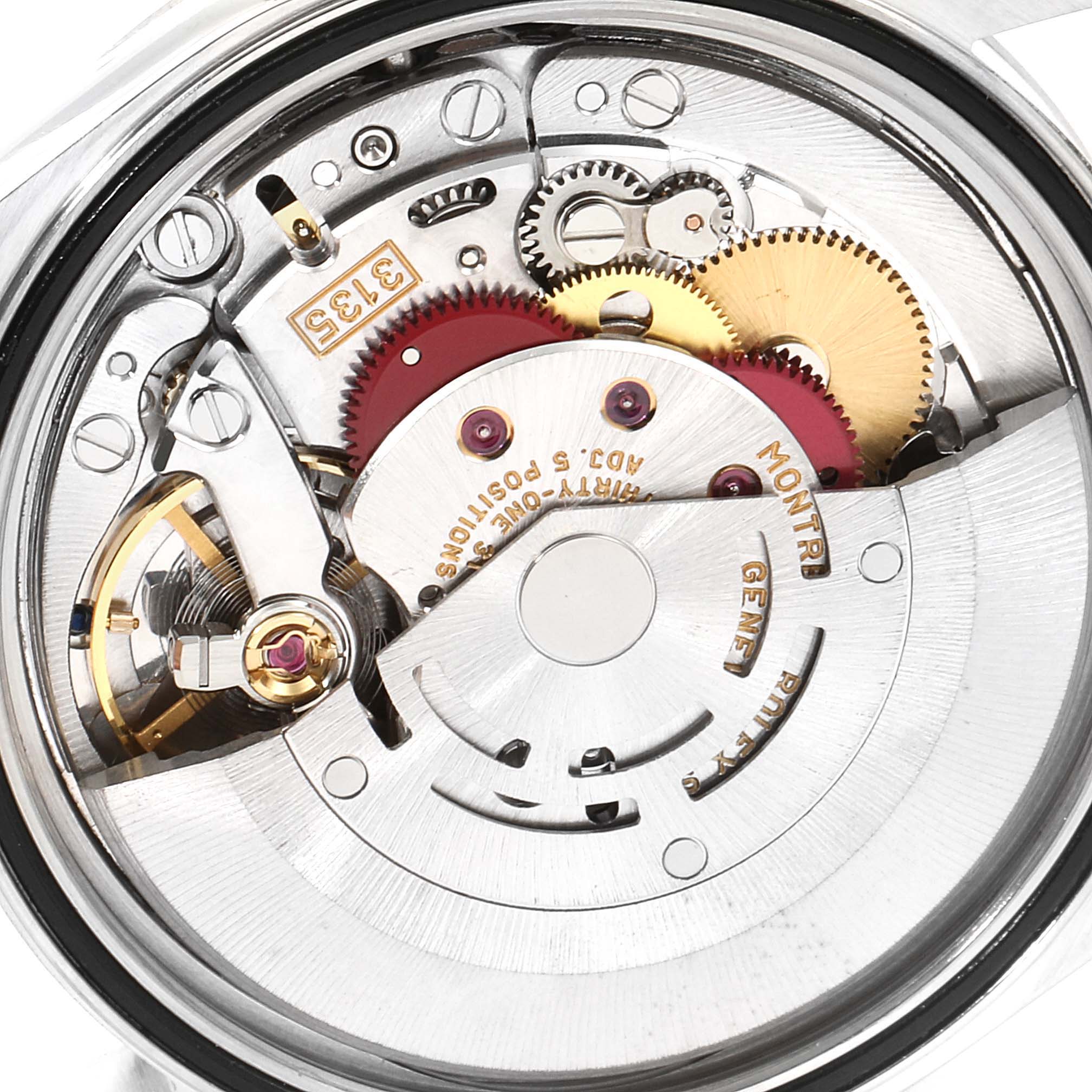 The image shows a close-up view of the exposed movement and mechanism of a Rolex Datejust 16234 Men's Stainless Steel Pink Dial 16234 Men's Stainless Steel Pink Dial watch.