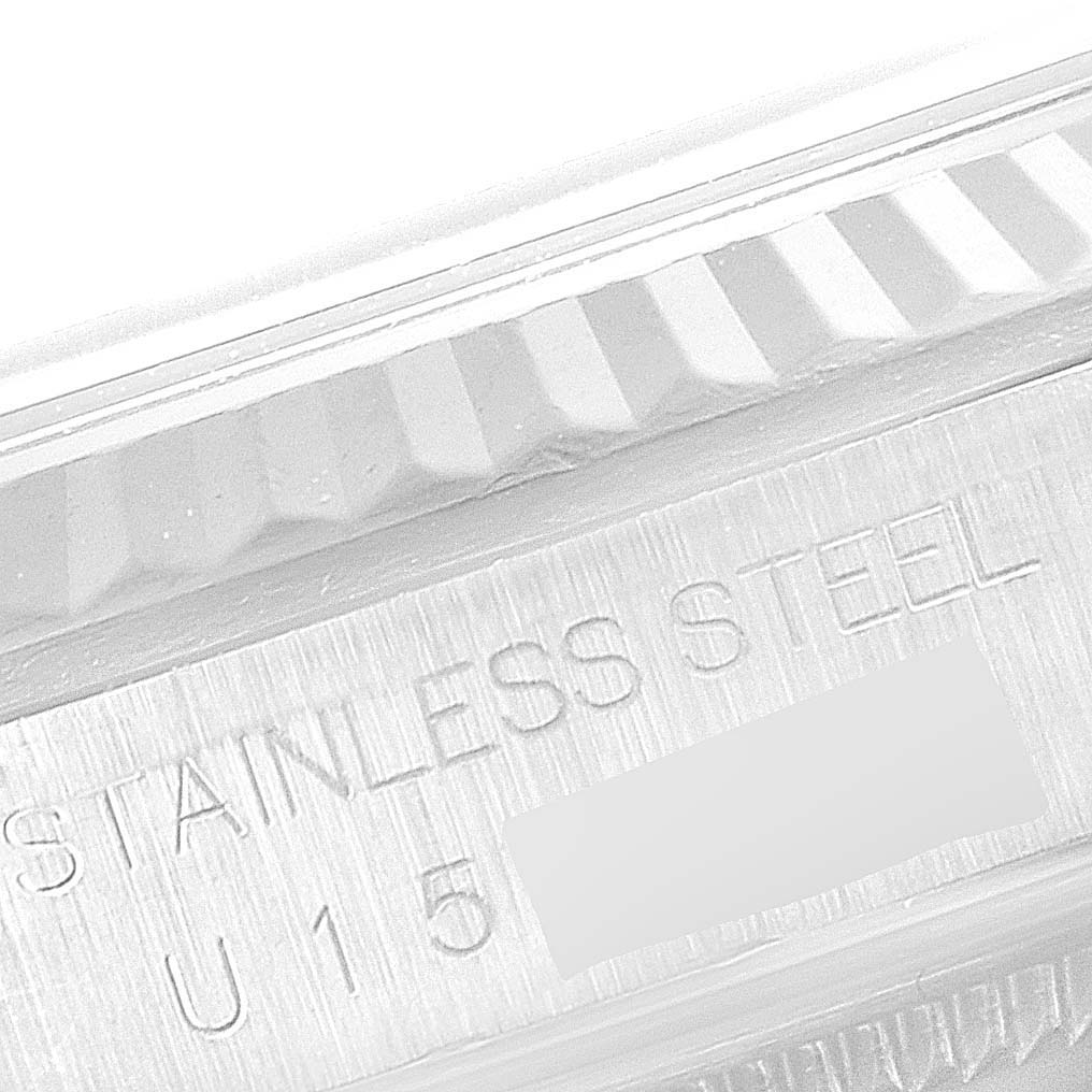 This image shows a close-up angle of the case side of a Rolex Datejust 16234 Men's Stainless Steel Pink Dial 16234 Men's Stainless Steel Pink Dial, highlighting the stainless steel material and serial number.