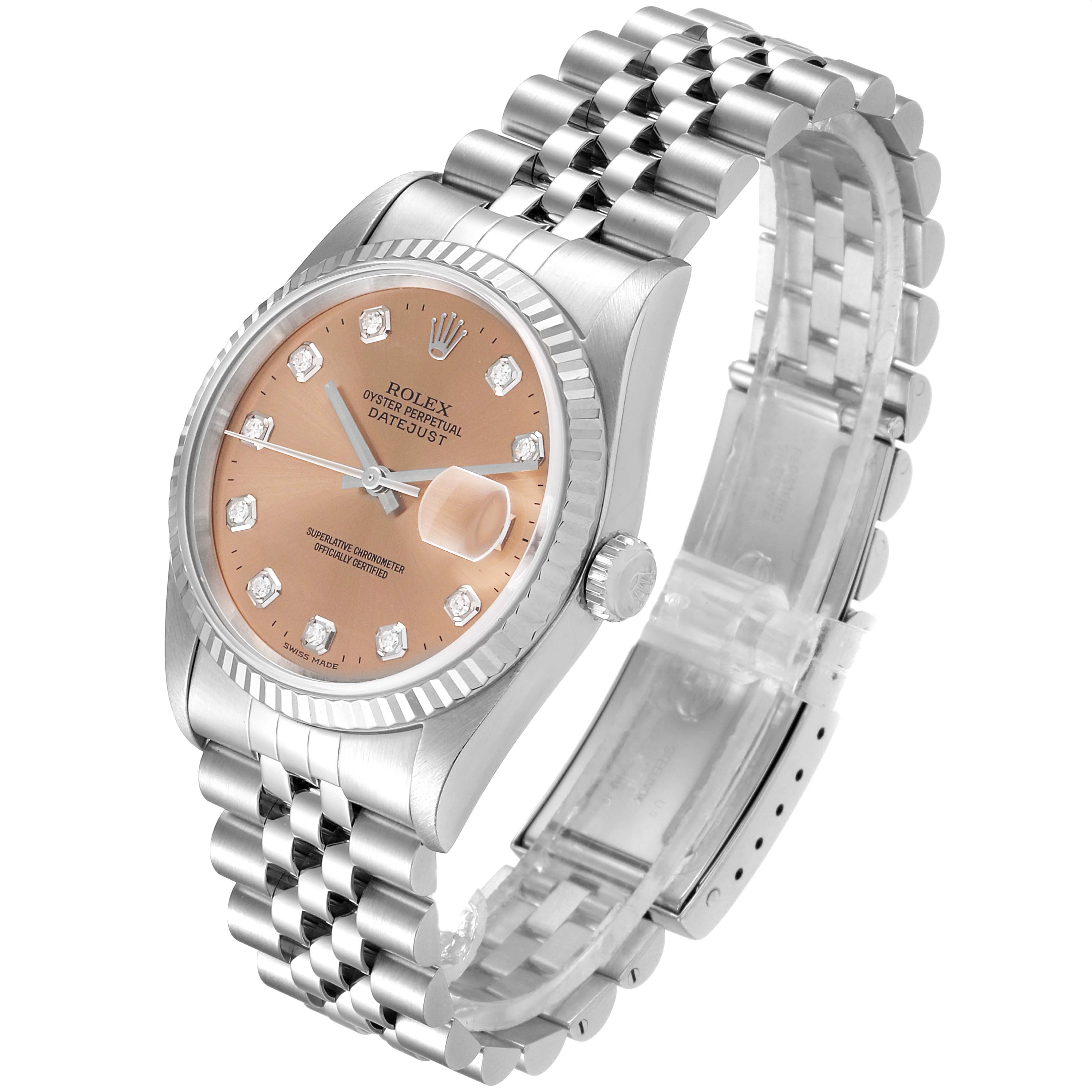 This image shows a Rolex Datejust 16234 Men's Stainless Steel Pink Dial 16234 Men's Stainless Steel Pink Dial watch from a three-quarter angle, highlighting its face, bezel, crown, and metal bracelet.