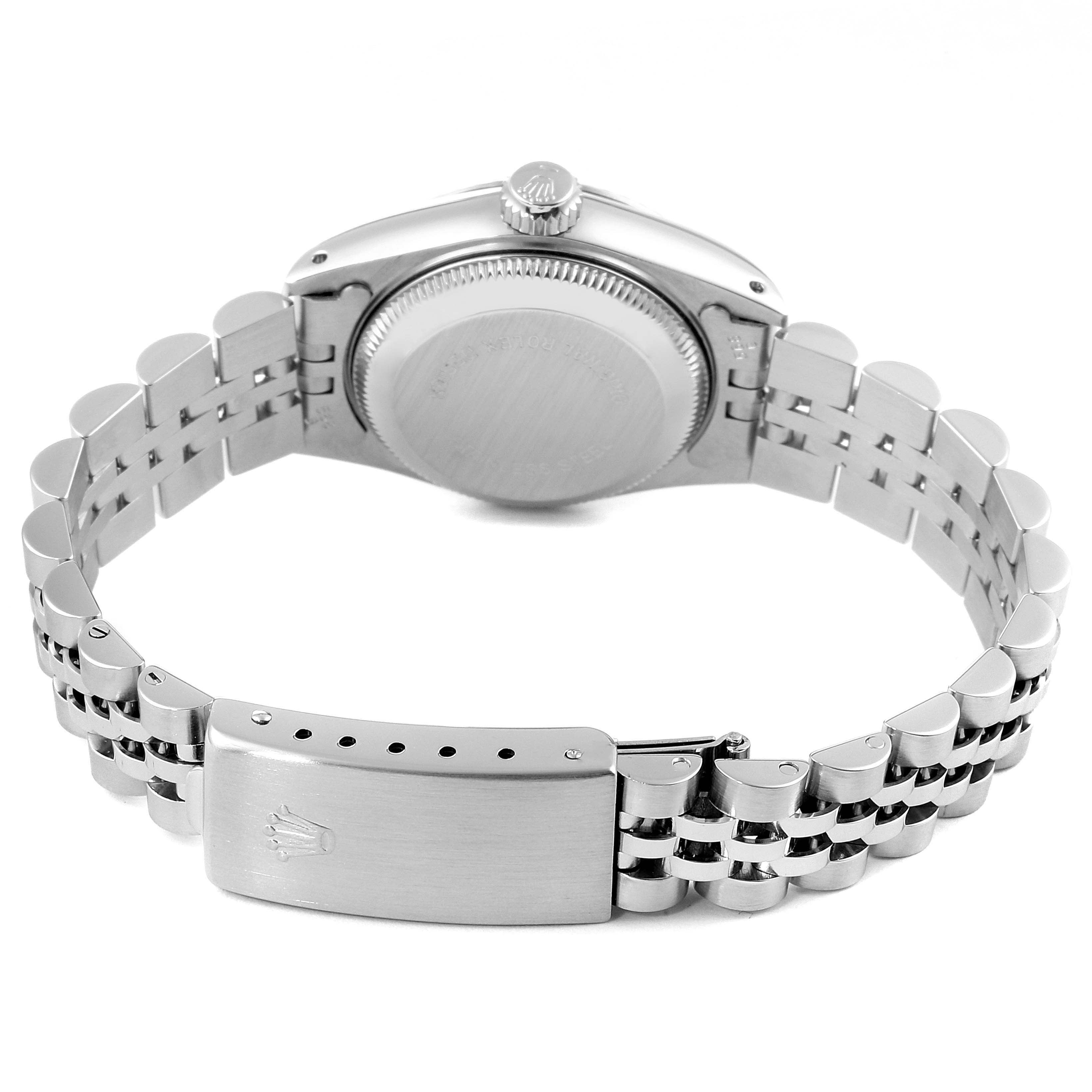 The image shows the back side of a Rolex Datejust 69174 Women's Stainless Steel Silver Dial 69174 Women's Stainless Steel Silver Dial watch, highlighting its clasp, bracelet, and case back.