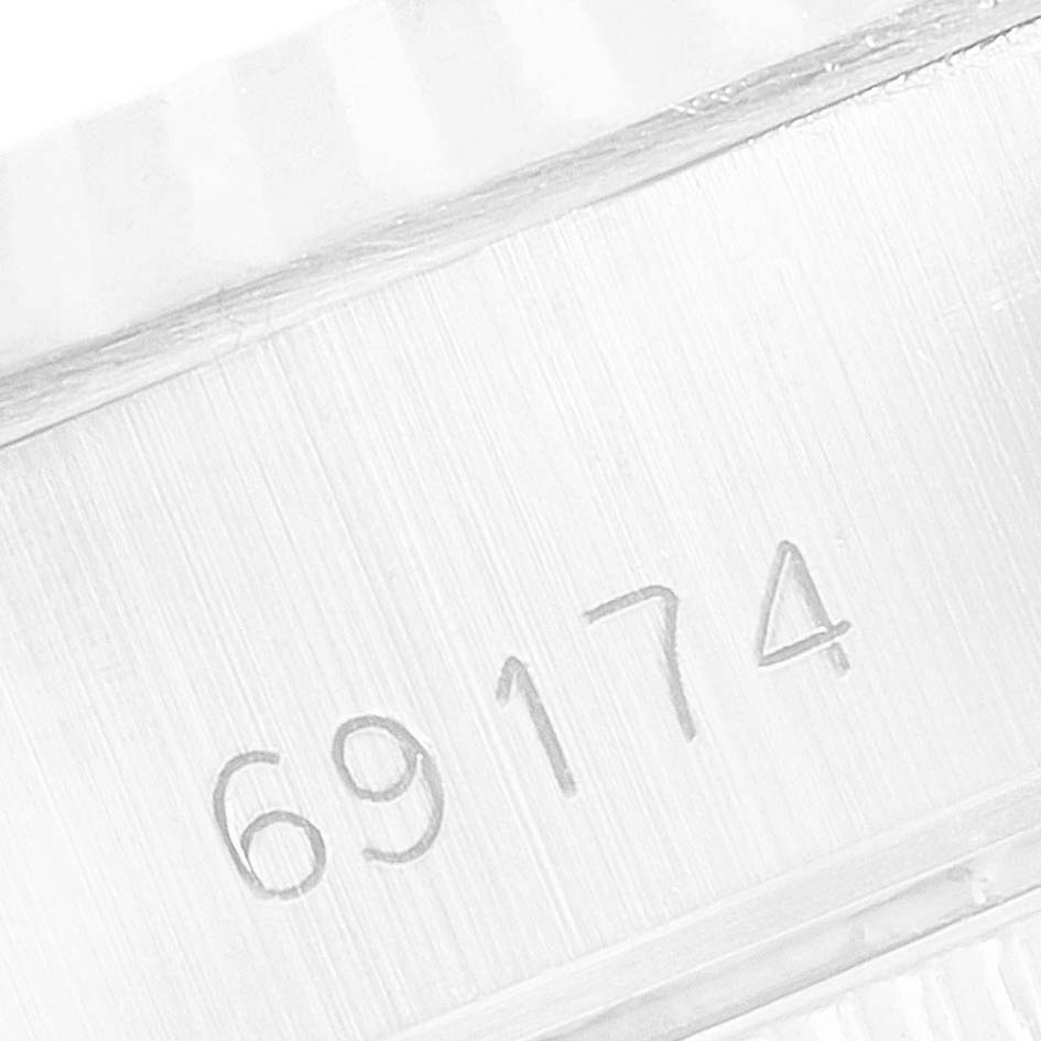 The image shows a close-up of the caseback with the reference number 69174 for the Rolex Datejust 69174 Women's Stainless Steel Silver Dial 69174 Women's Stainless Steel Silver Dial model.