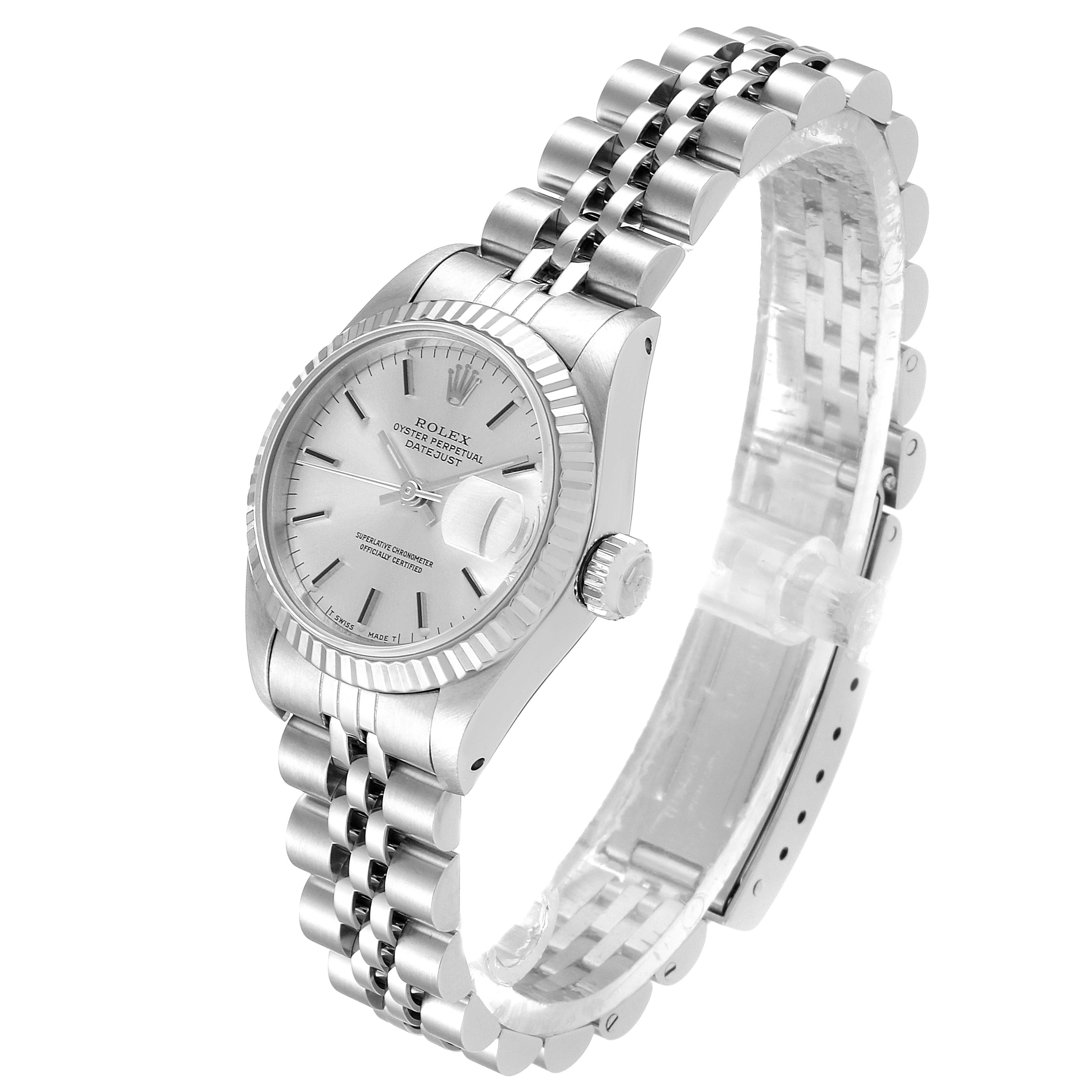 This image shows a Rolex Datejust 69174 Women's Stainless Steel Silver Dial 69174 Women's Stainless Steel Silver Dial watch from a high-angle perspective, displaying the face, bezel, crown, and bracelet.