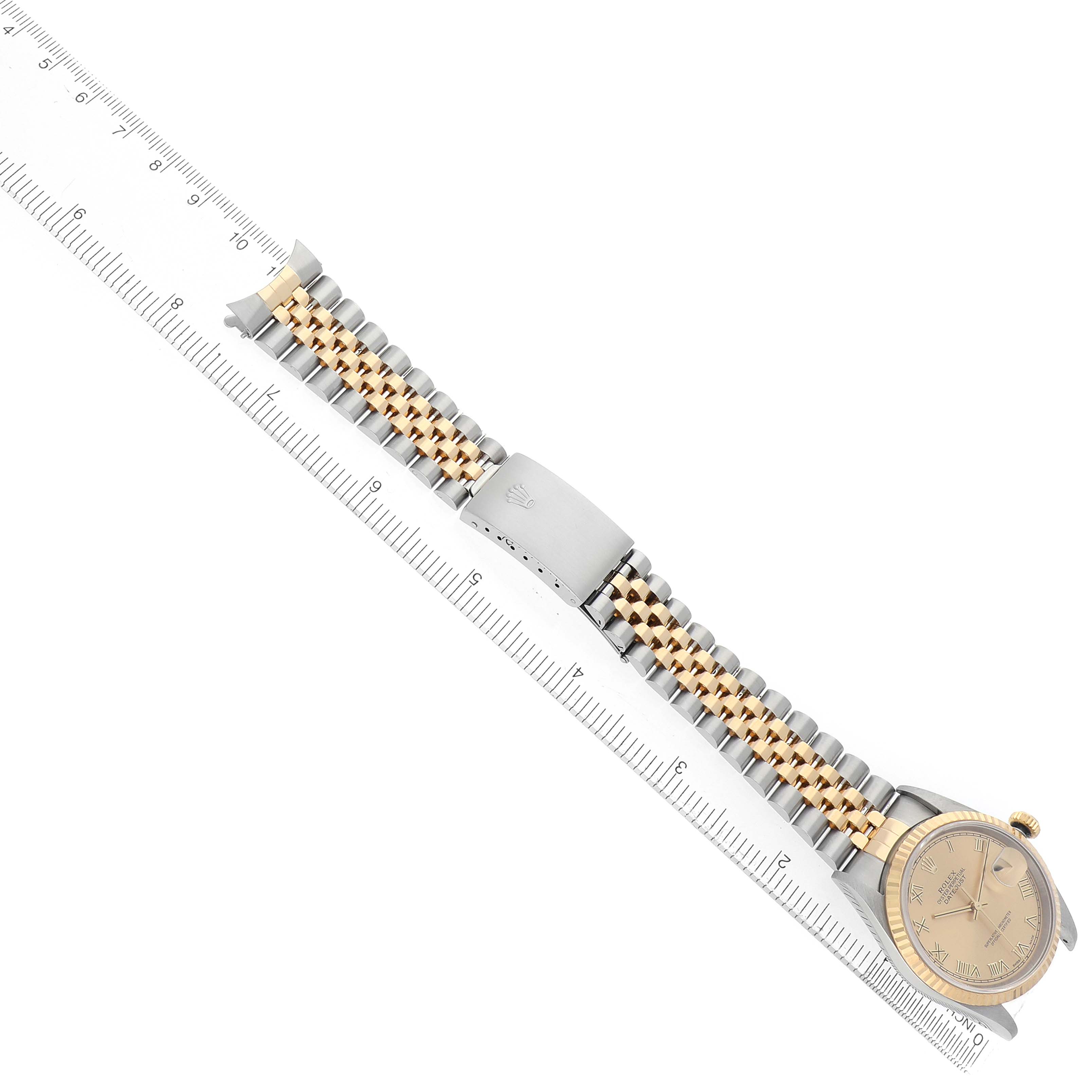 The Rolex Datejust 16233 Men's Steel and Gold (two tone) Champagne Dial watch is shown at an angle displaying the entire bracelet, clasp, and part of the dial and case.