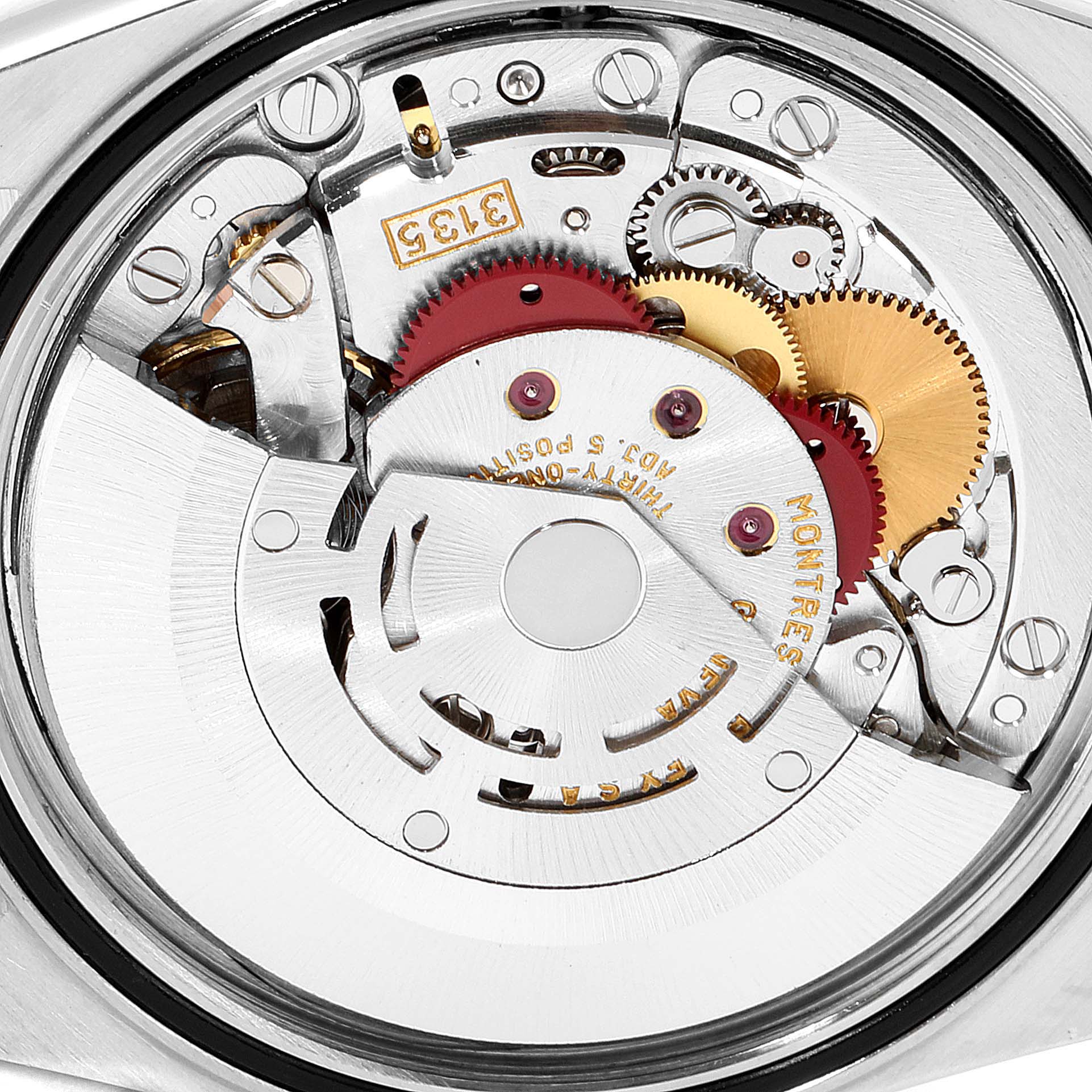 This image shows a close-up view of the internal movement components of a Rolex Datejust 16233 Men
s Steel and Gold (two tone) Champagne Dial 16233 Men
s Steel and Gold (two tone) Champagne Dial watch.