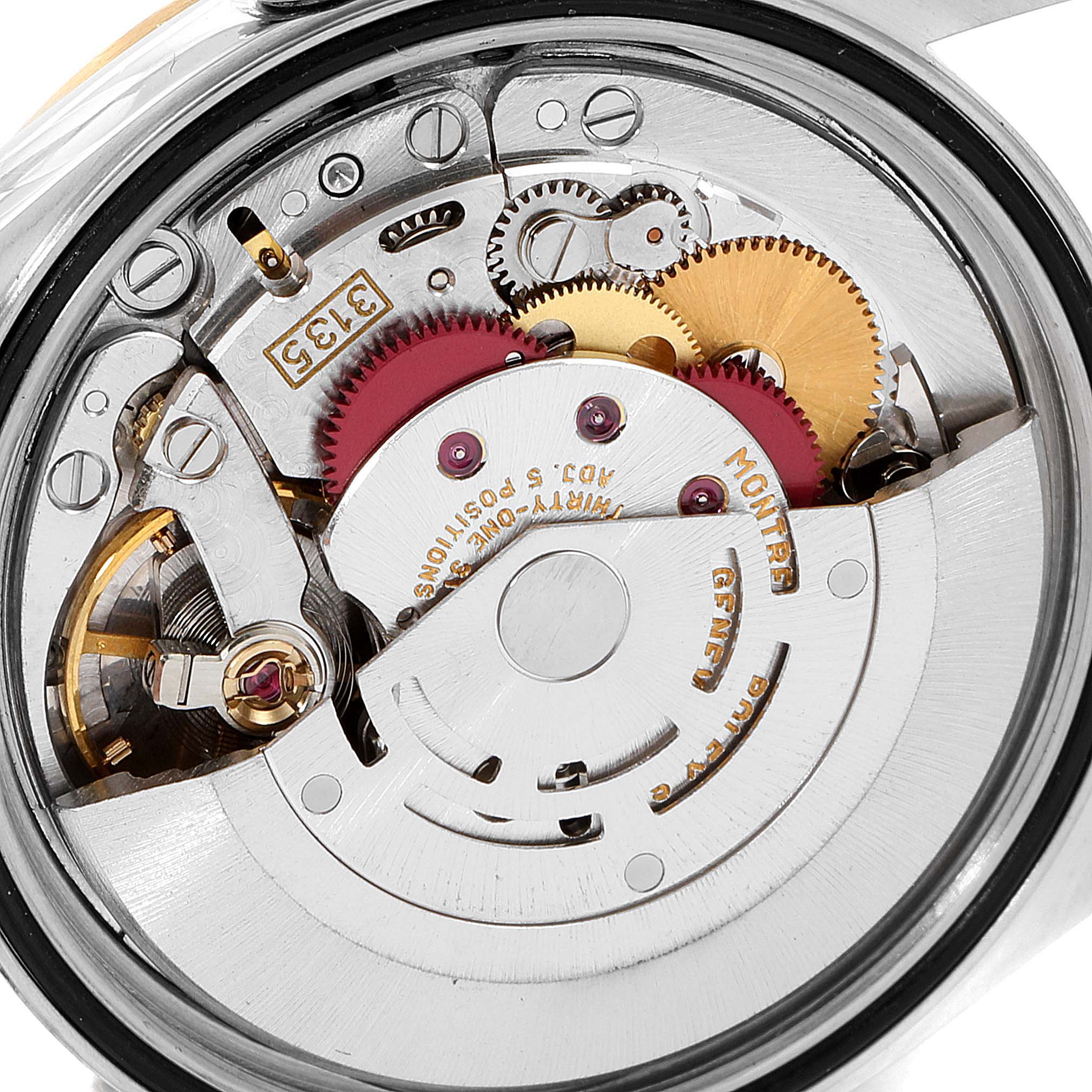 This image shows the inner mechanical components and movement of a Rolex Datejust 16233 Men's Steel and Gold (two tone) Champagne Dial 16233 Men's Steel and Gold (two tone) Champagne Dial watch.