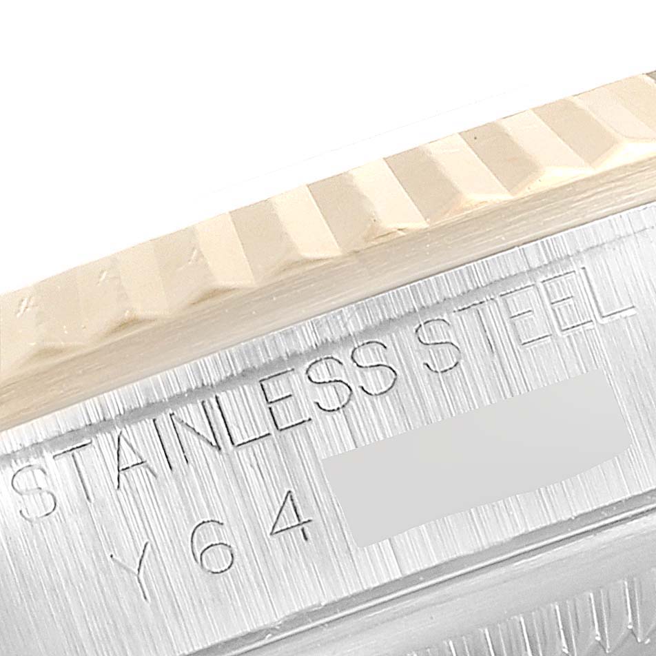 The image shows a close-up of the stainless steel case and fluted bezel of a Rolex Datejust 16233 Men's Steel and Gold (two tone) White Dial 16233 Men's Steel and Gold (two tone) White Dial watch.