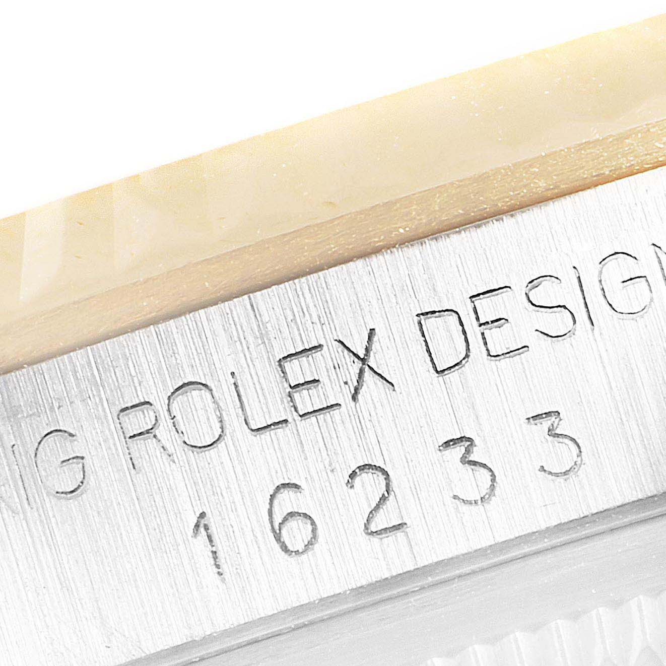 The image shows an angled close-up of the Datejust model by Rolex with the model number 16233 engraved on the case.