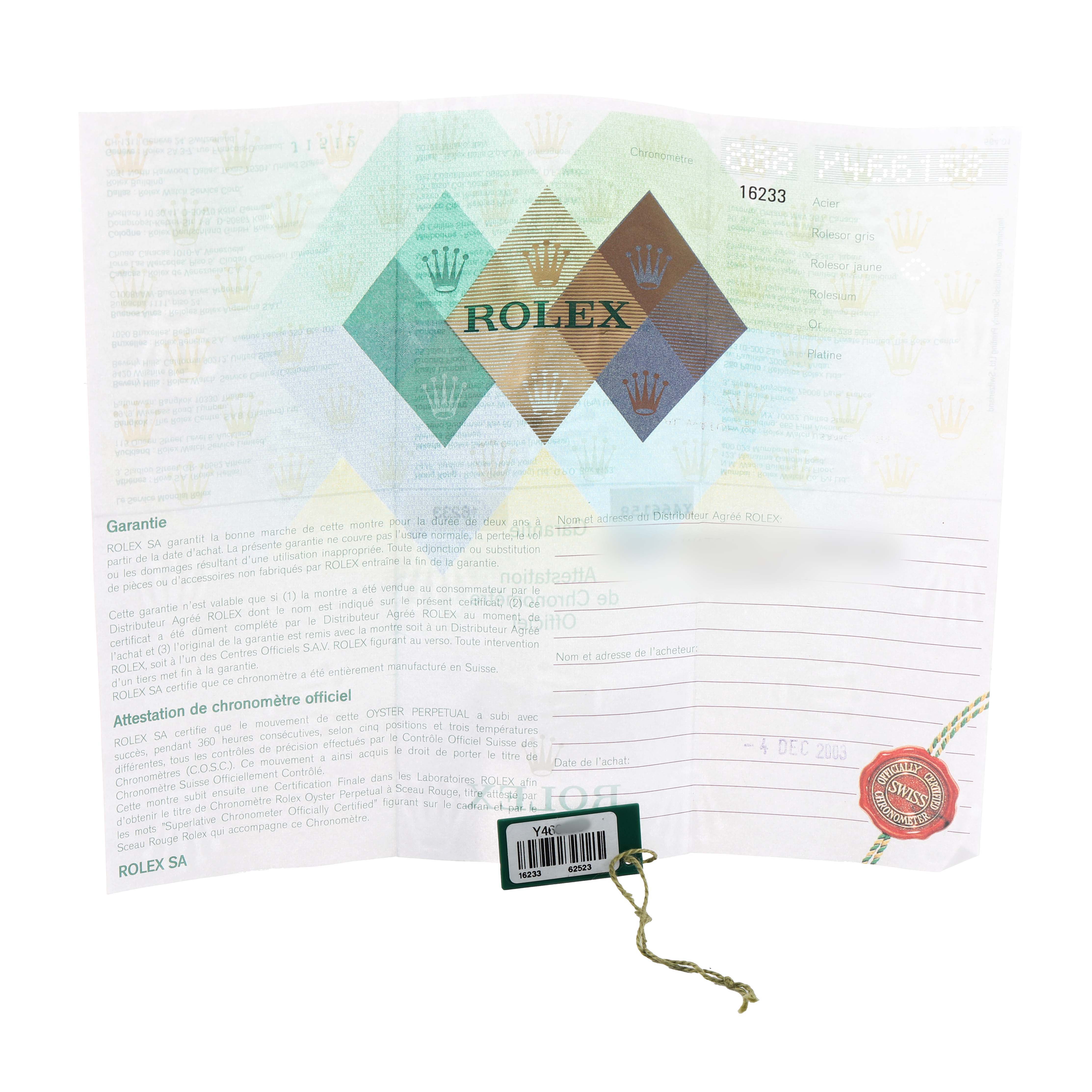 The image shows a guarantee certificate for a Rolex Datejust 16233 Men's Steel and Gold (two tone) White Dial watch, viewed from the top.