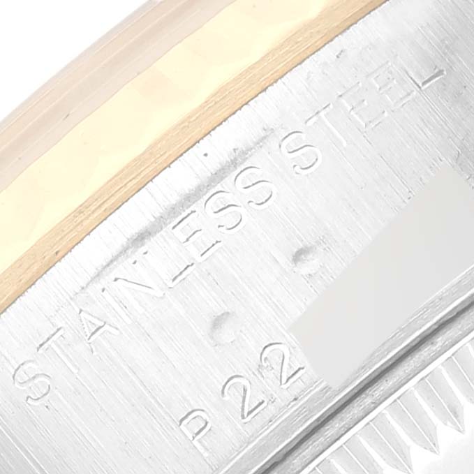 This close-up image shows the stainless steel case back and part of the case edge of the Rolex Datejust 79173 Women's Steel and Gold (two tone) White Dial 79173 Women's Steel and Gold (two tone) White Dial.