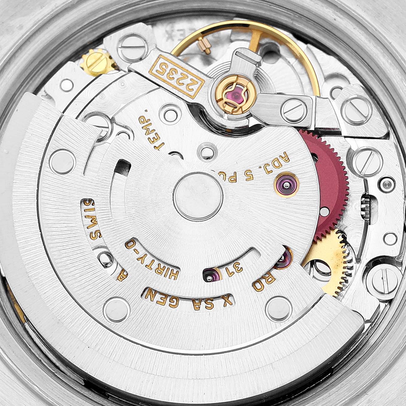The image shows the inner mechanism, or movement, of a Rolex Datejust 79173 Women's Steel and Gold (two tone) White Dial 79173 Women's Steel and Gold (two tone) White Dial watch viewed from a close-up angle.
