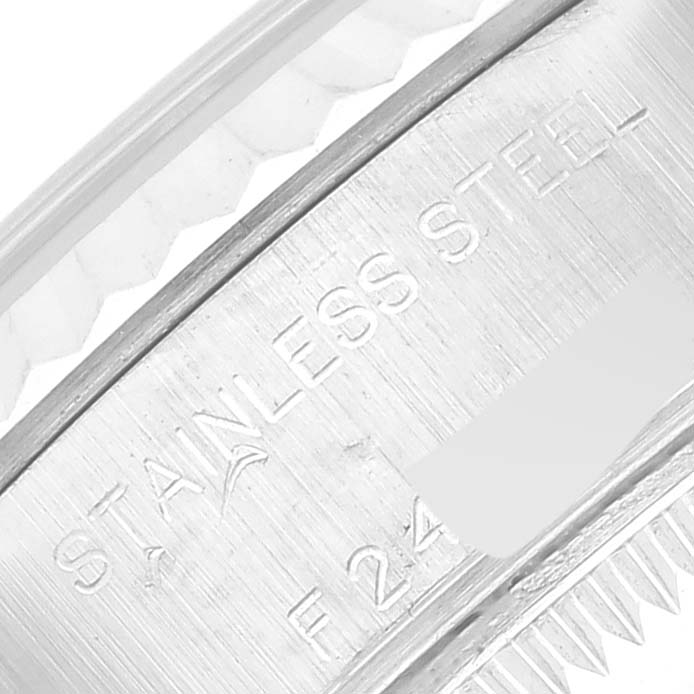 This image shows a close-up of the stainless steel casing of a Rolex Datejust 79174 Women's Stainless Steel Pink Dial 79174 Women's Stainless Steel Pink Dial watch.